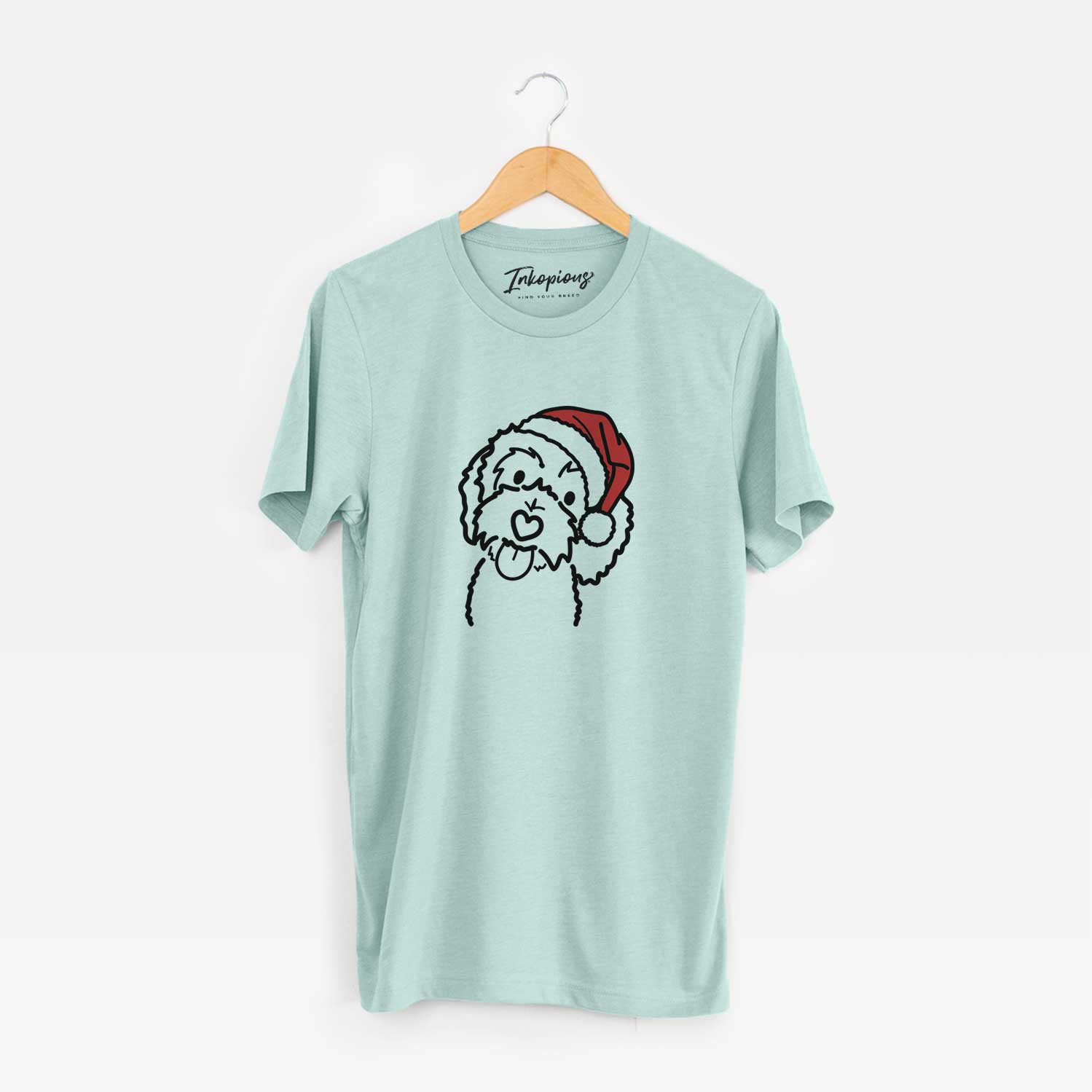 Minimalist line drawing of Mabel the Bernedoodle wearing a Santa hat on a Heather Sage Unisex crewneck