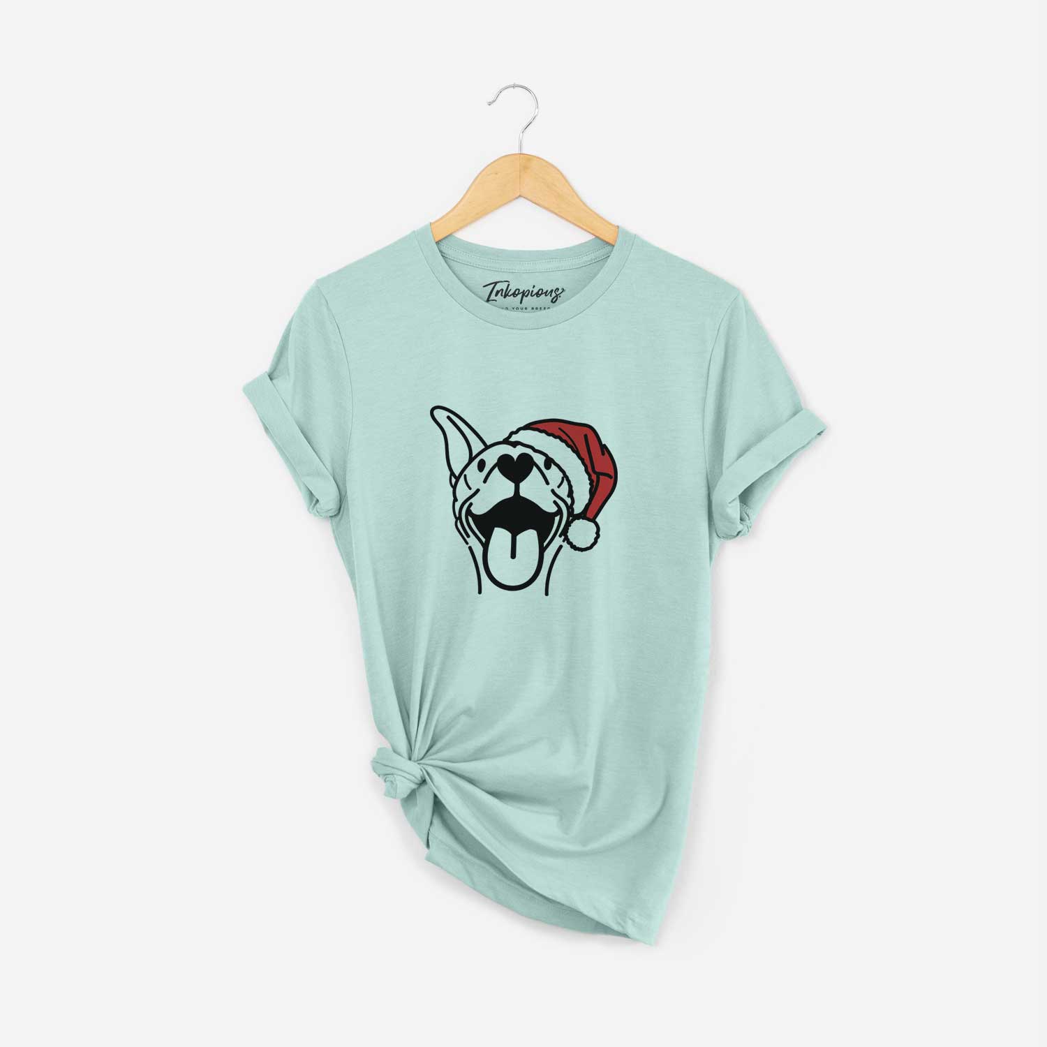 Minimalist line drawing of Merlin the Basenji wearing a Santa hat on a Heather Sage Unisex crewneck