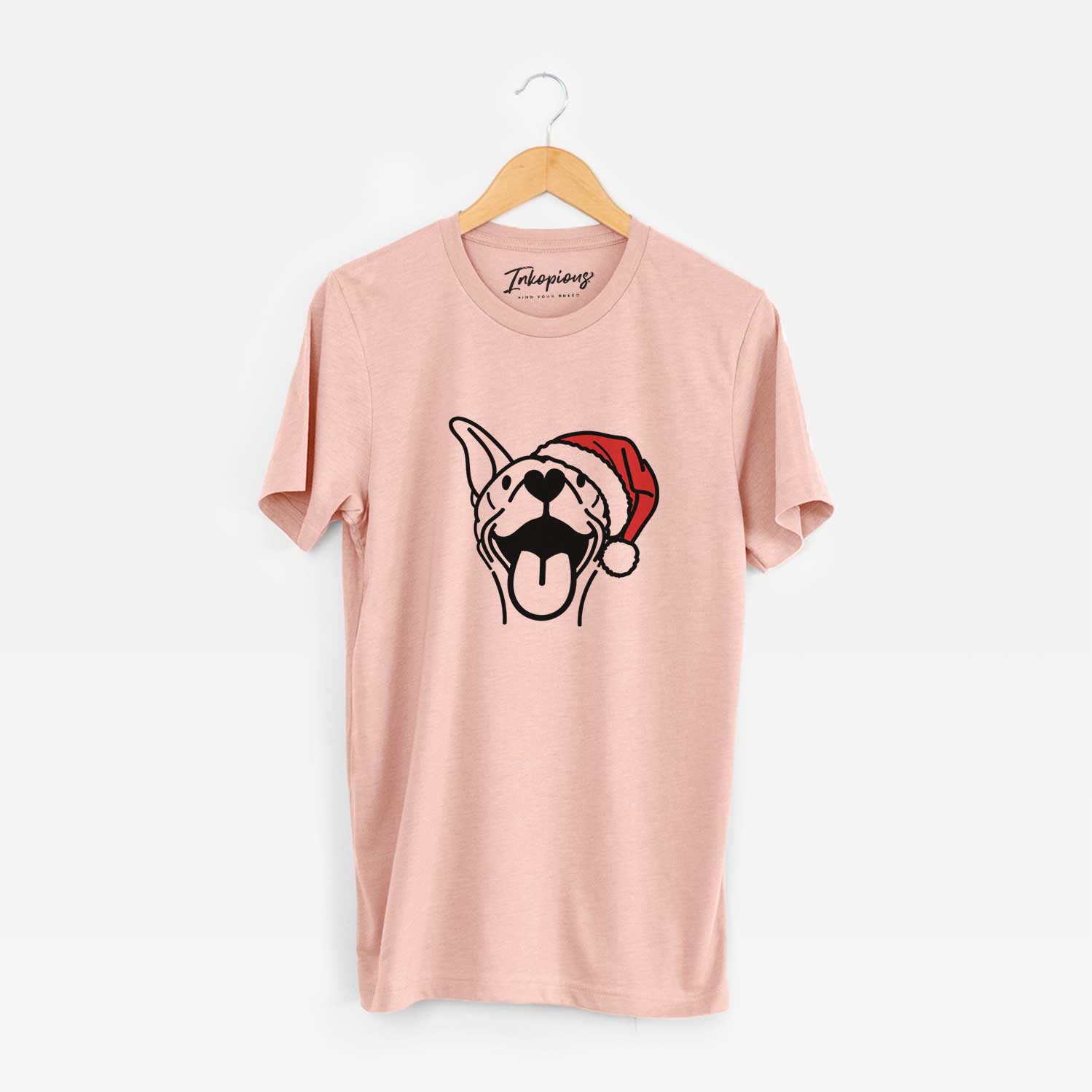 Minimalist line drawing of Merlin the Basenji wearing a Santa hat on a Peach Unisex crewneck