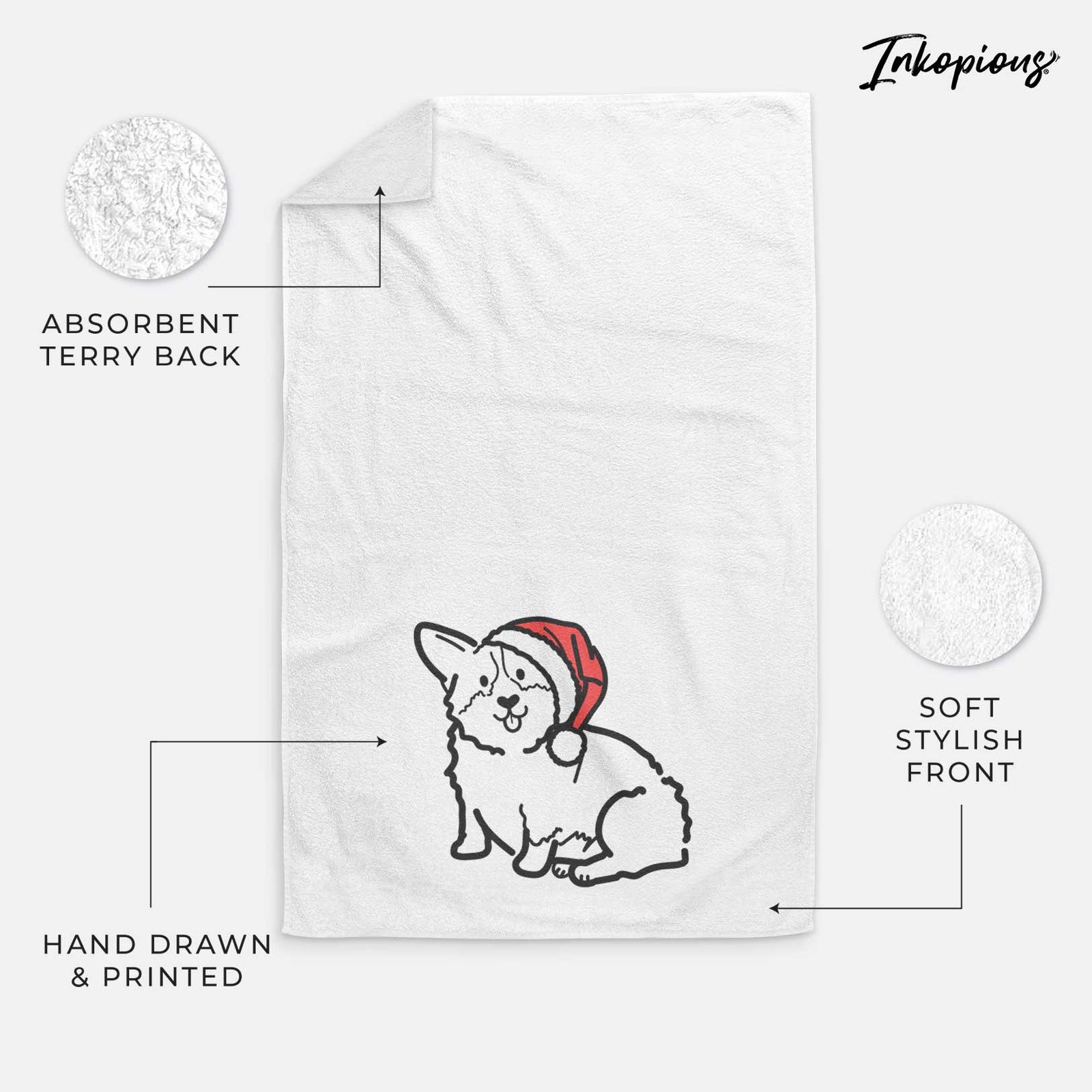 Minimalist line drawing of Millie the Pembroke Welsh Corgi wearing a Santa hat on a decorative hand towel