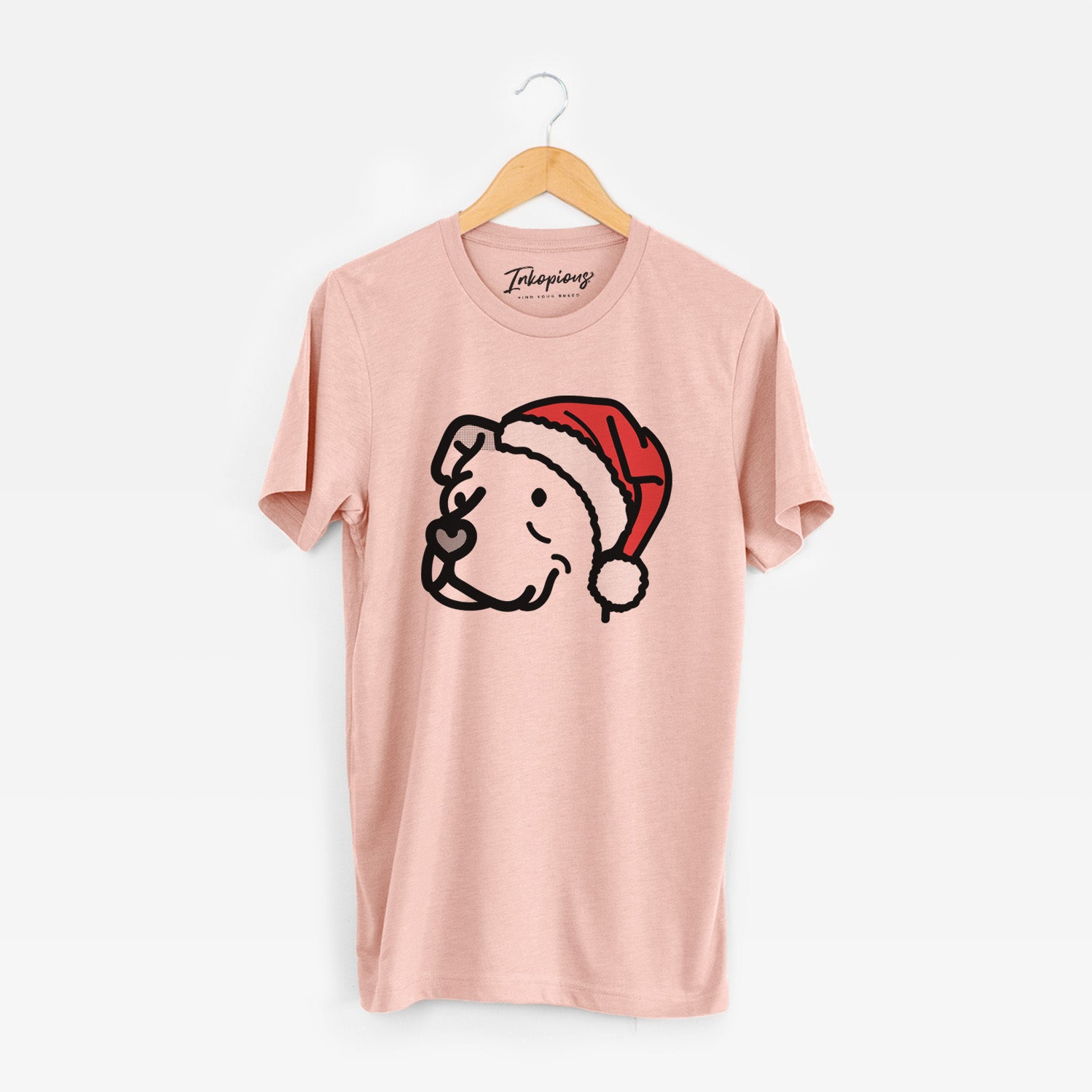 Minimalist line drawing of Mr. Sir the Pitbull Mix wearing a Santa hat on a Peach Unisex crewneck