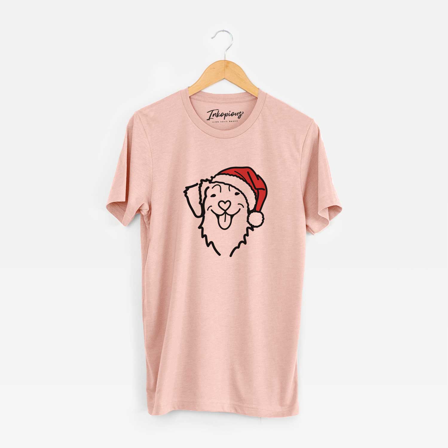 Minimalist line drawing of a Nova Scotia Duck Tolling Retriever wearing a Santa hat on a Peach Unisex crewneck