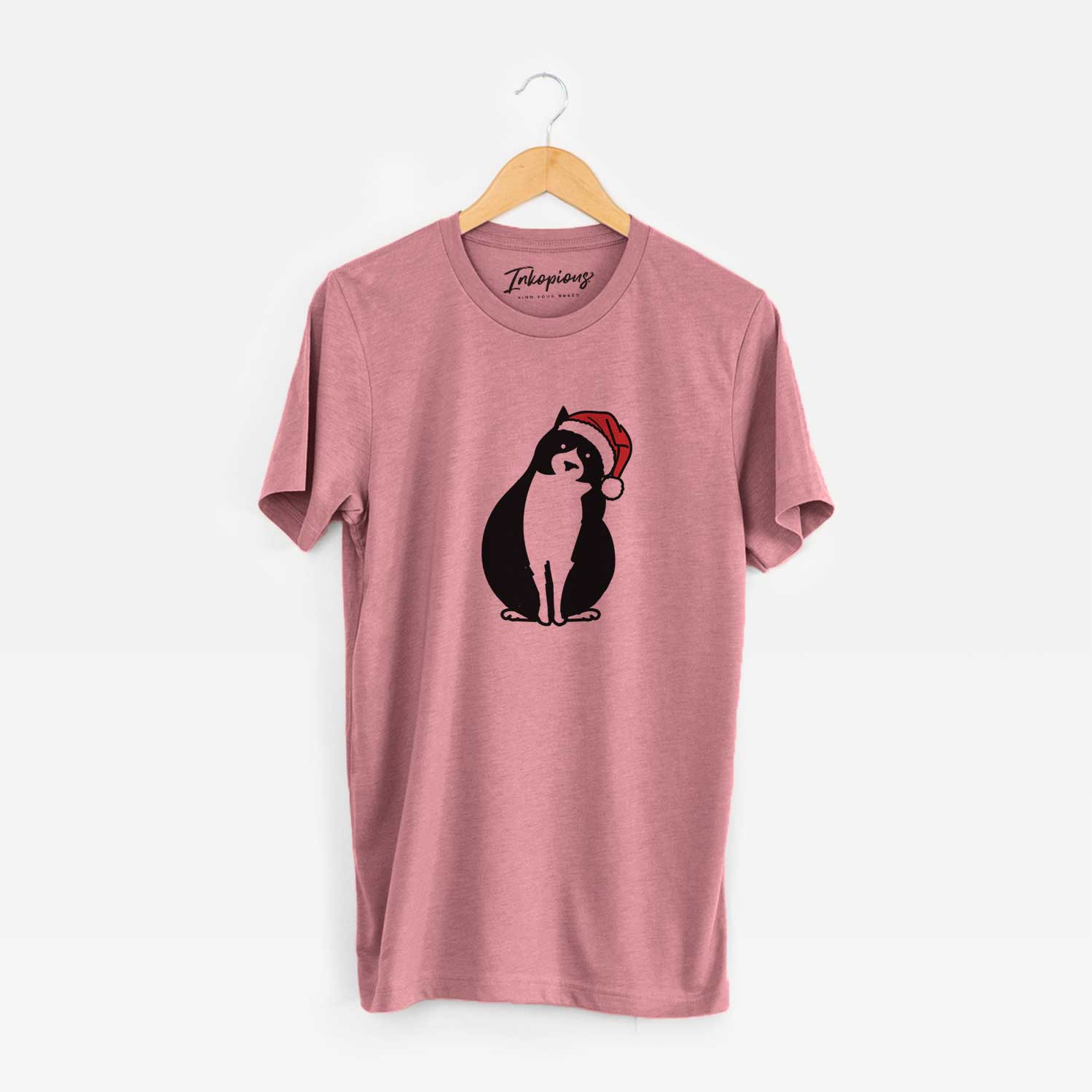 Minimalist line drawing of Oliver the Tuxedo Cat wearing a Santa hat on a Mauve Unisex crewneck