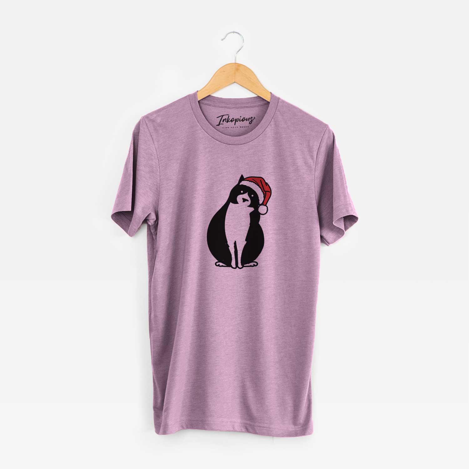 Minimalist line drawing of Oliver the Tuxedo Cat wearing a Santa hat on an Orchid Unisex crewneck