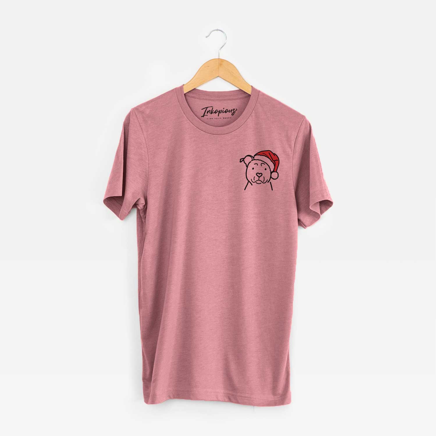 Small chest-pocket minimalist line drawing of an American Staffordshire Terrier wearing a Santa hat on a Mauve Unisex crewneck