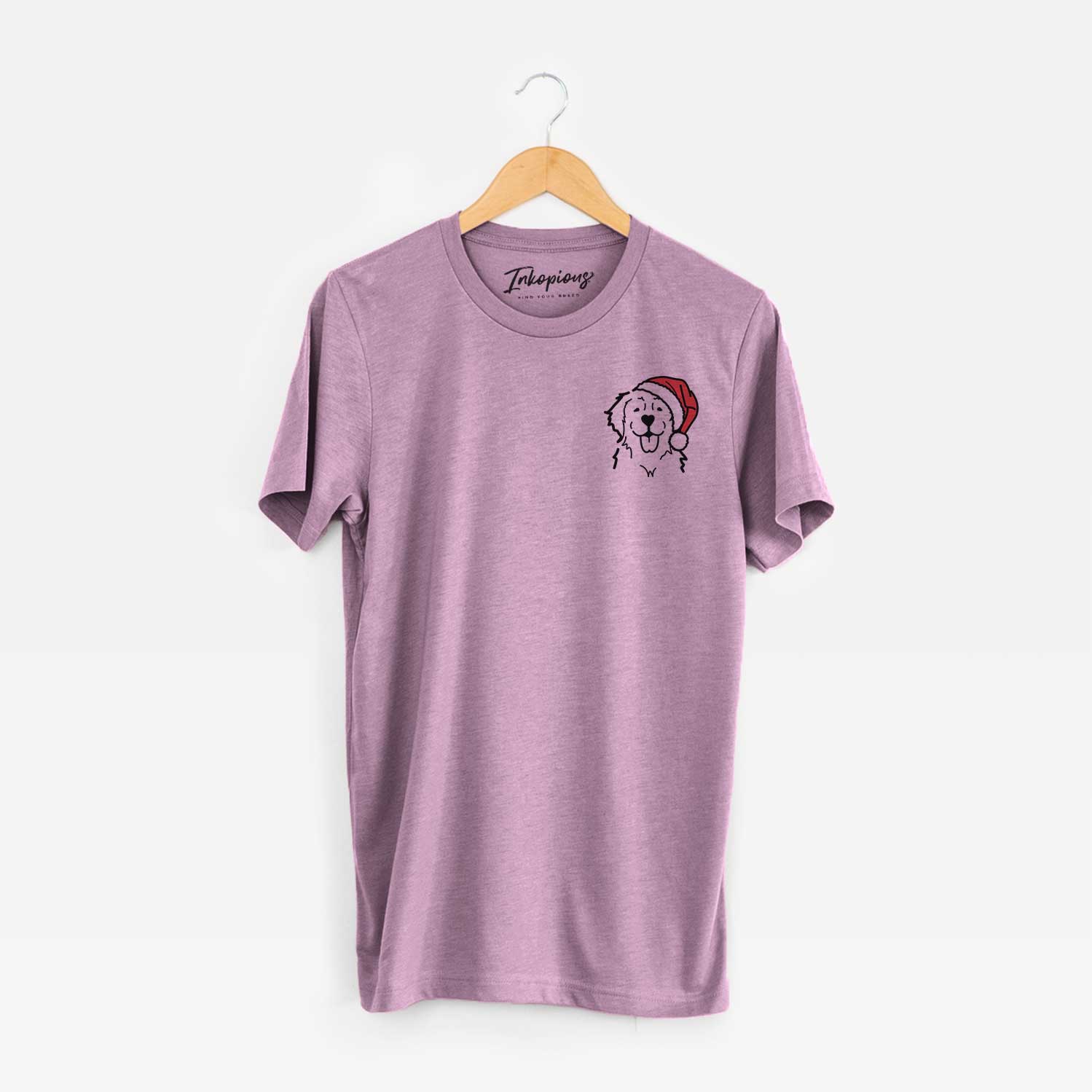 Small chest-pocket minimalist line drawing of a Golden Retriever wearing a Santa hat on an Orchid Unisex crewneck