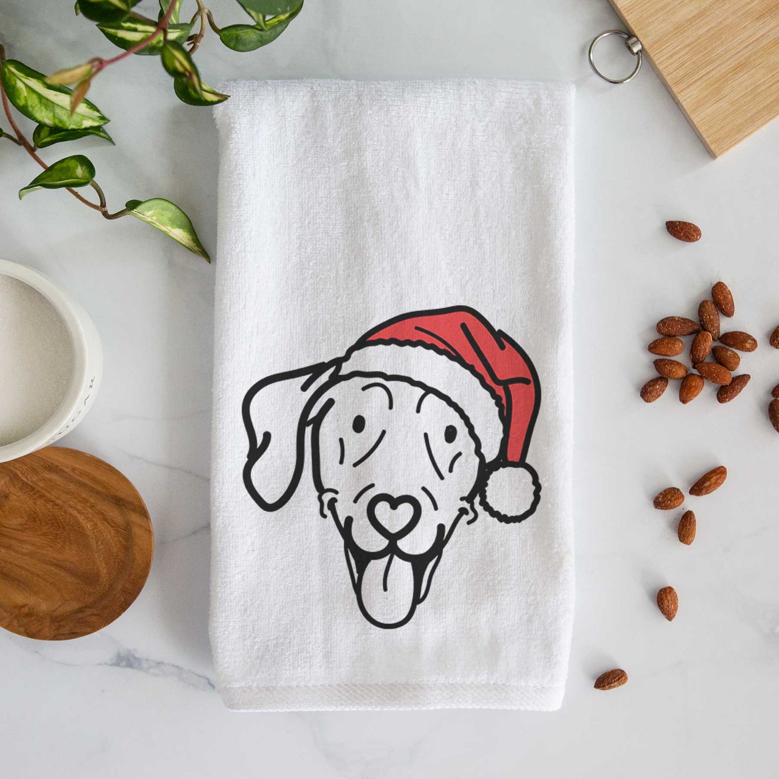 Minimalist line drawing of Paco Lobo the Weimaraner wearing a Santa hat on a decorative hand towel