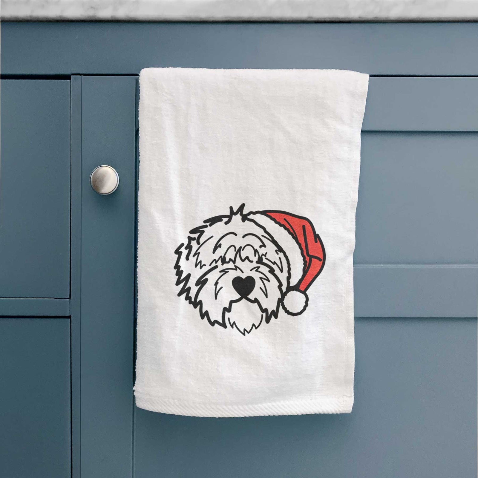 Minimalist line drawing of Penny the Old English Sheepdog wearing a Santa hat on a decorative hand towel