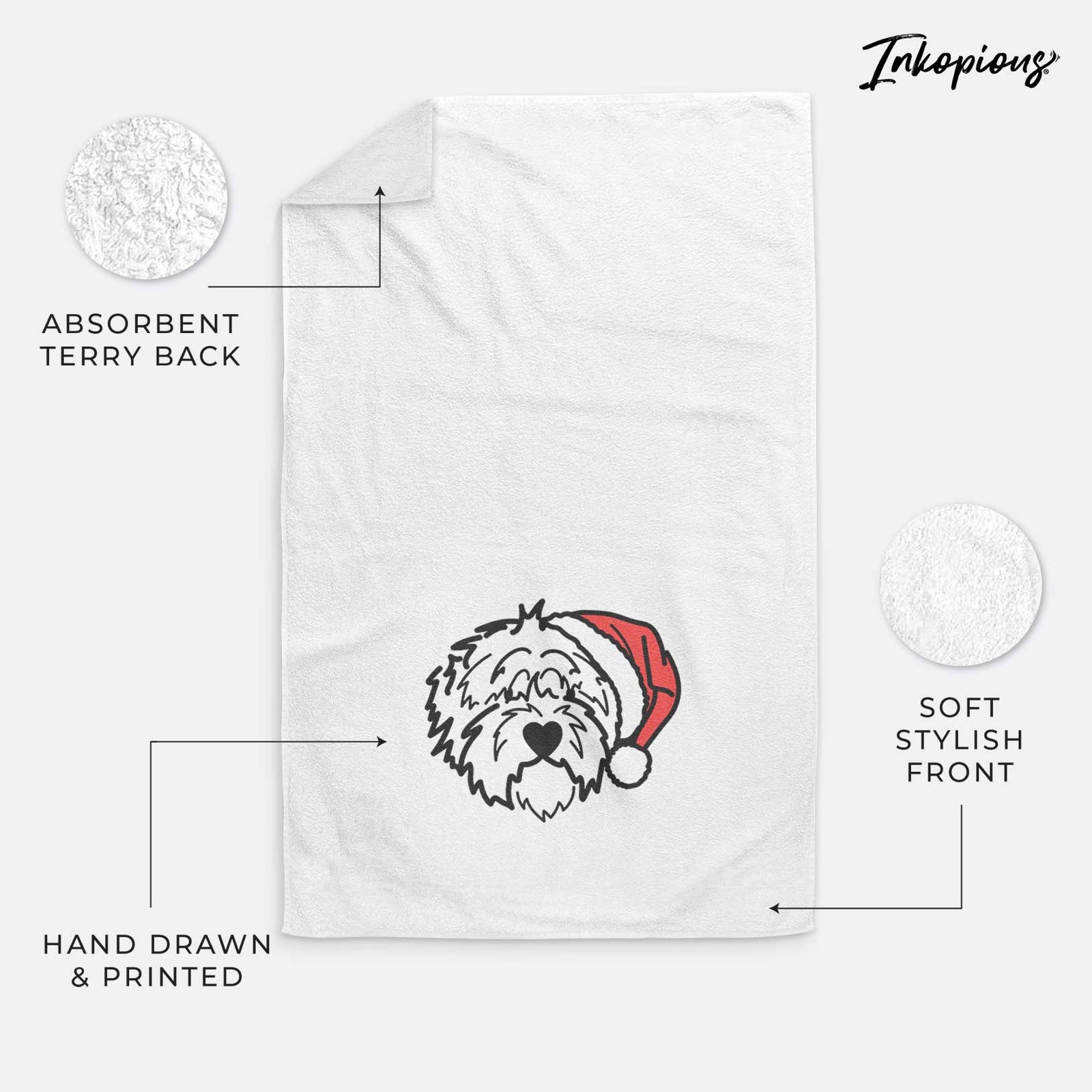 Minimalist line drawing of Penny the Old English Sheepdog wearing a Santa hat on a decorative hand towel