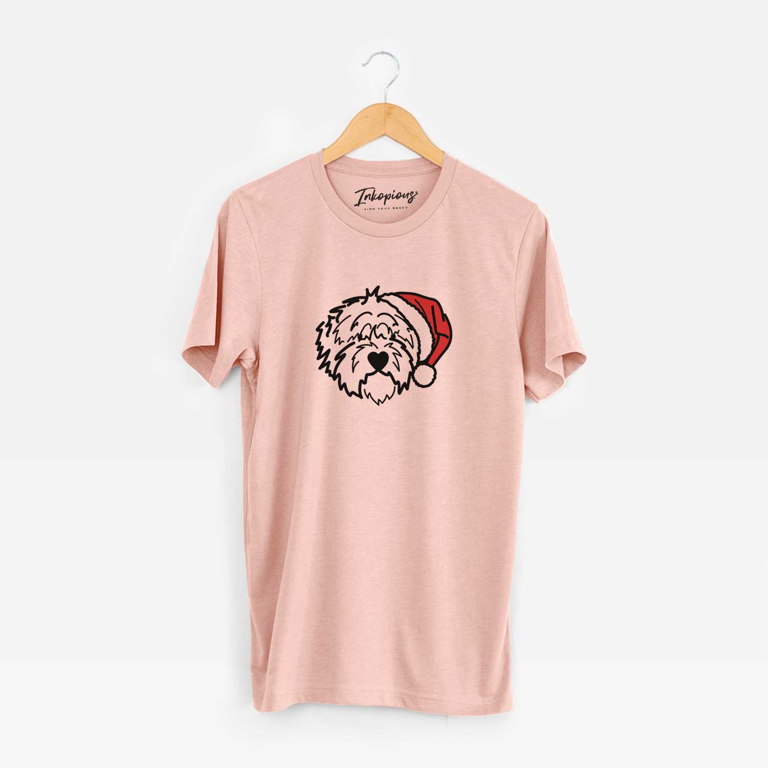 Minimalist line drawing of Penny the Old English Sheepdog wearing a Santa hat on a Peach Unisex crewneck