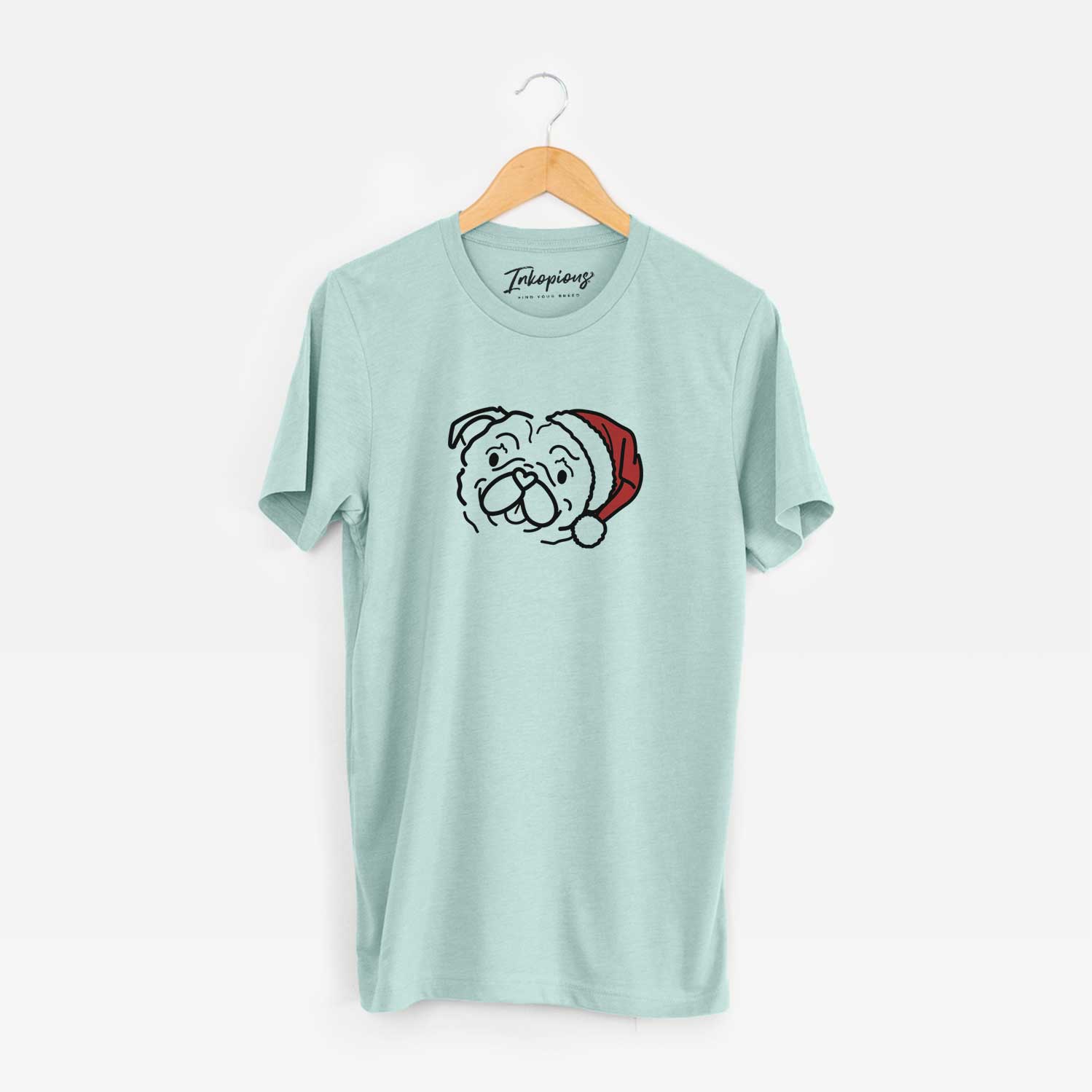 Minimalist line drawing of Pip the Pug wearing a Santa hat on a Heather Sage Unisex crewneck