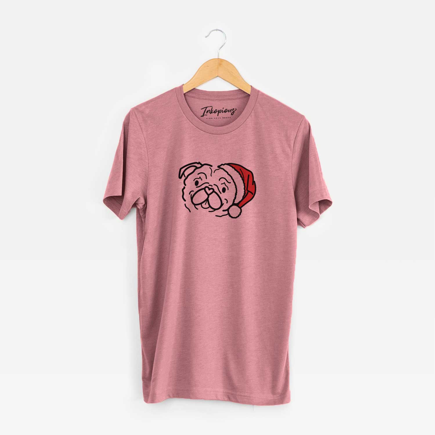 Minimalist line drawing of Pip the Pug wearing a Santa hat on a Mauve Unisex crewneck