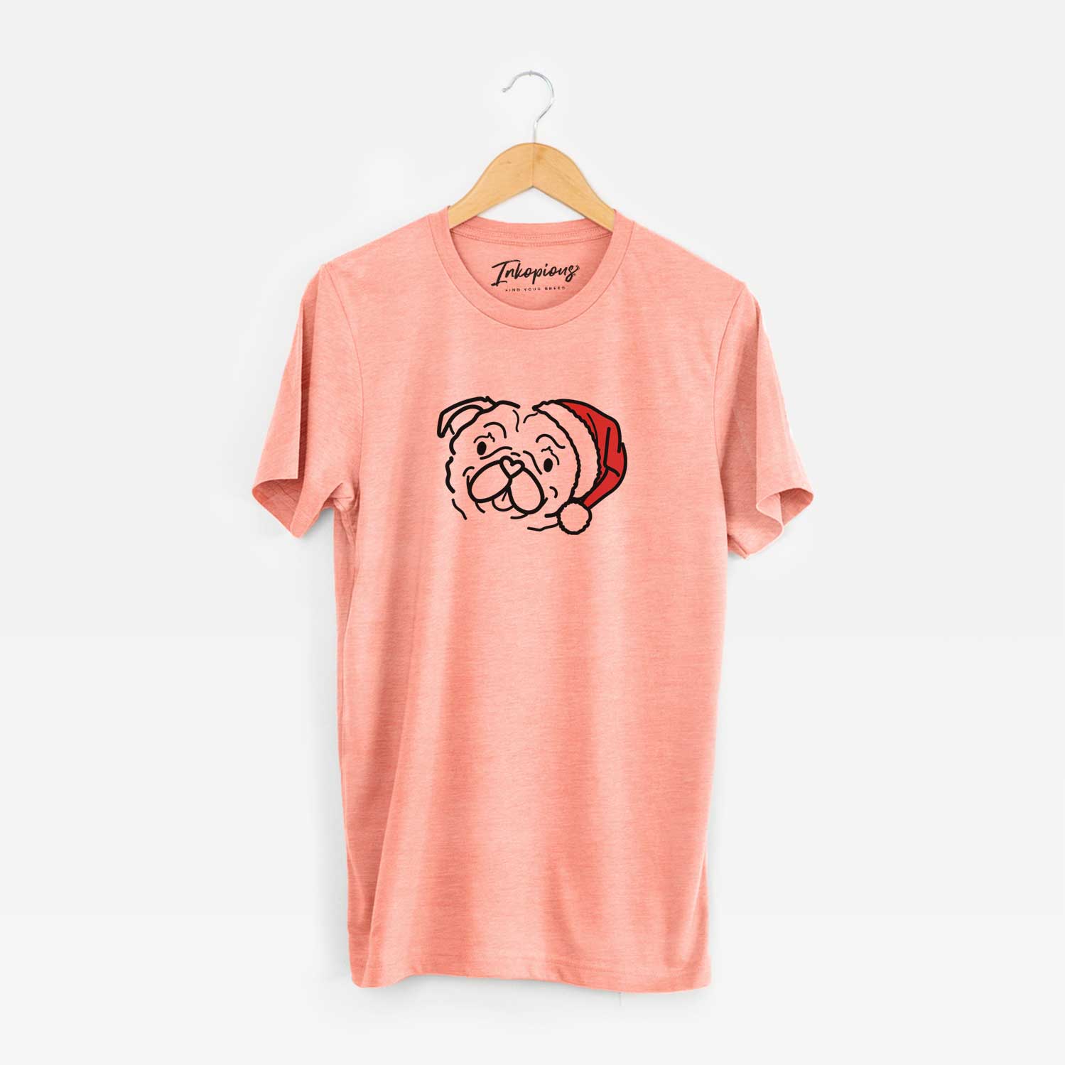 Minimalist line drawing of Pip the Pug wearing a Santa hat on a Sunset Unisex crewneck
