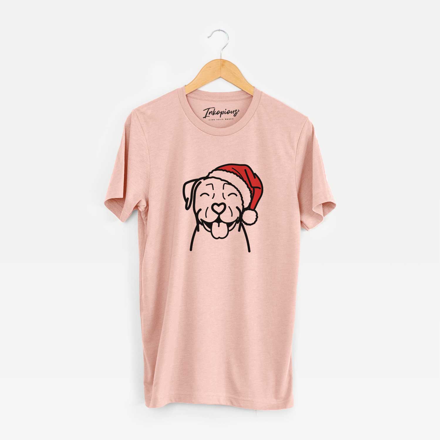 Minimalist line drawing of a Pitbull wearing a Santa hat on a Peach Unisex crewneck