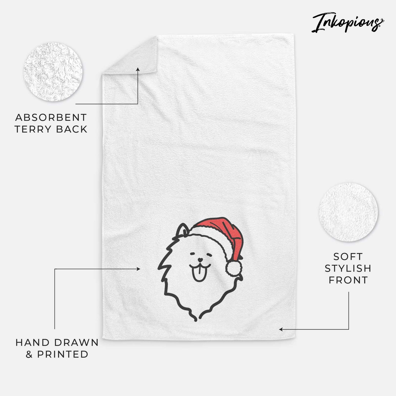 Minimalist line drawing of a Pomeranian wearing a Santa hat on a decorative hand towel