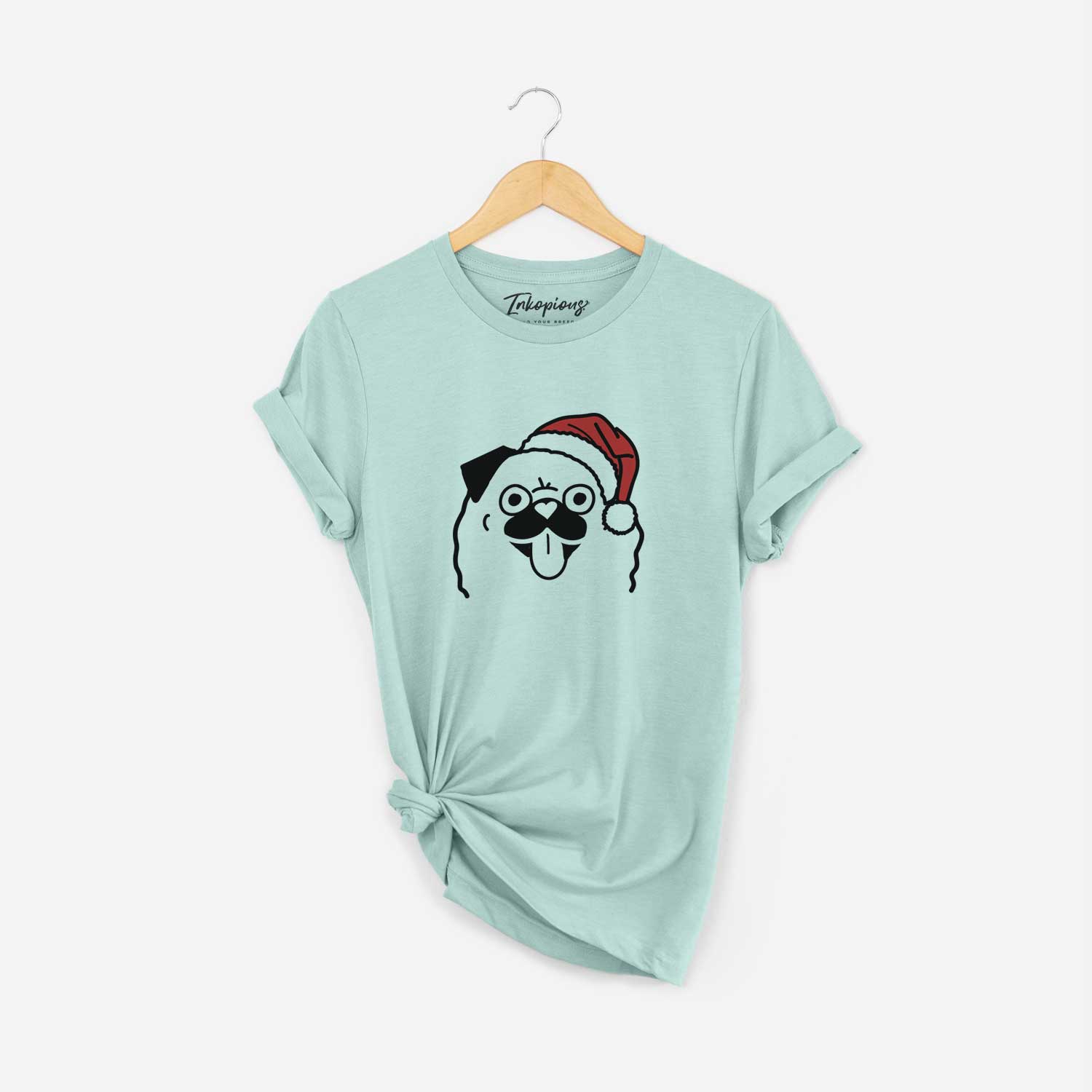 Minimalist line drawing of a Pug wearing a Santa hat on a Heather Sage Unisex crewneck
