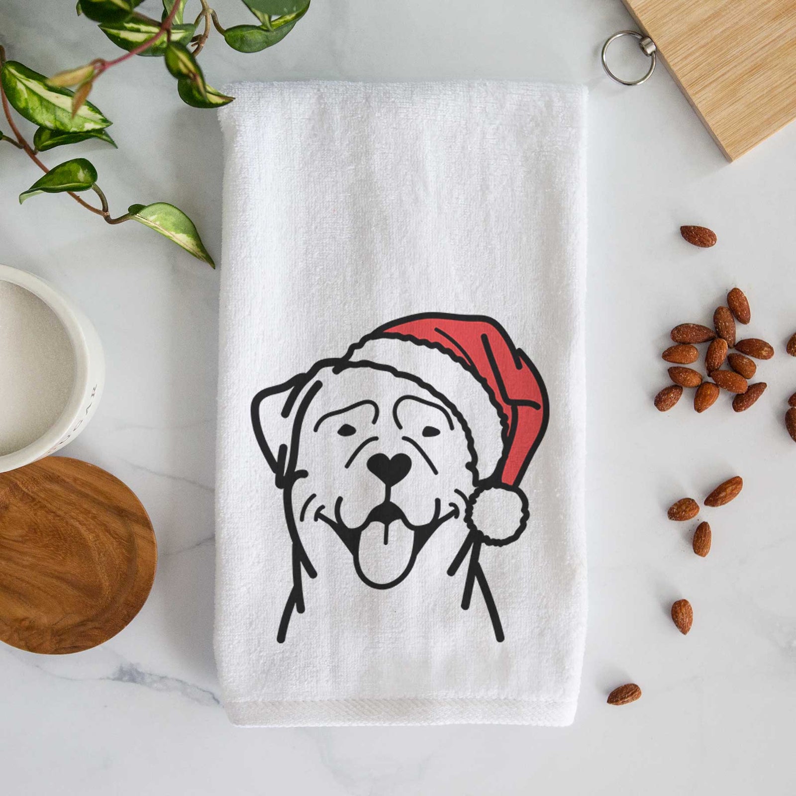 Minimalist line drawing of a Rottweiler wearing a Santa hat on a decorative hand towel
