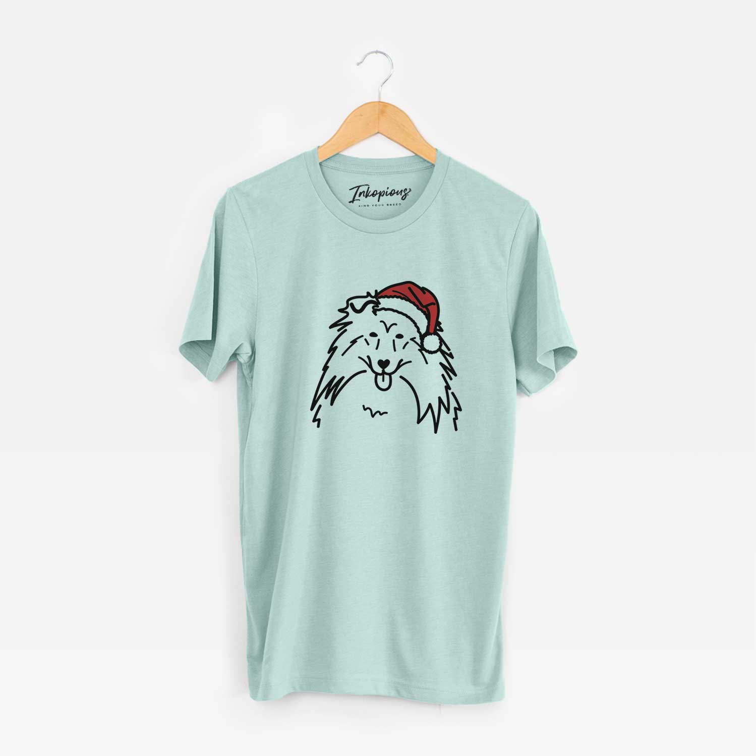 Minimalist line drawing of a Rough Collie wearing a Santa hat on a Heather Sage Unisex crewneck
