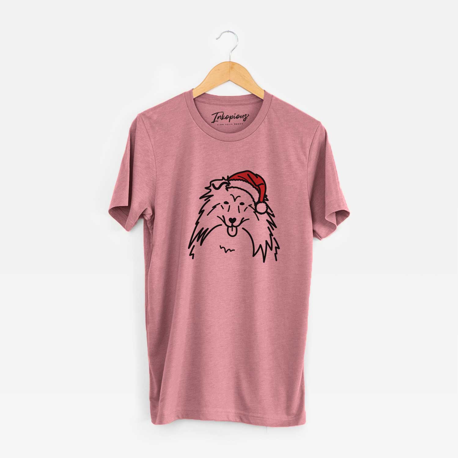 Minimalist line drawing of a Rough Collie wearing a Santa hat on a Mauve Unisex crewneck