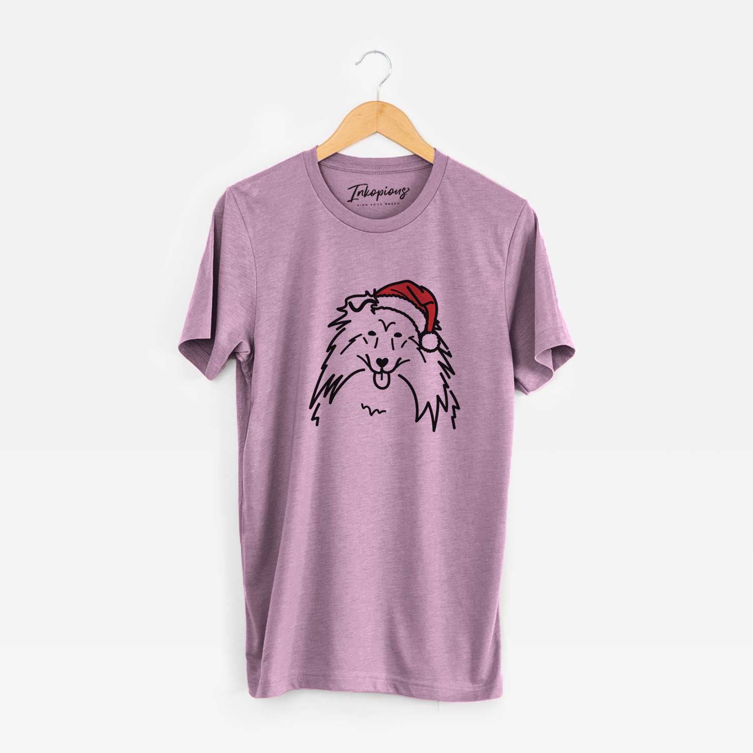 Minimalist line drawing of a Rough Collie wearing a Santa hat on an Orchid Unisex crewneck