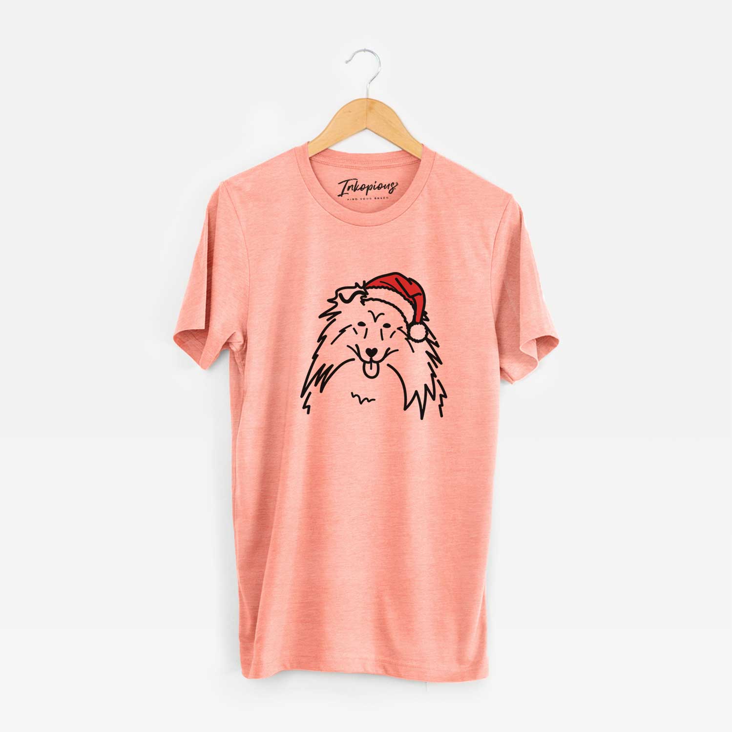 Minimalist line drawing of a Rough Collie wearing a Santa hat on a Sunset Unisex crewneck