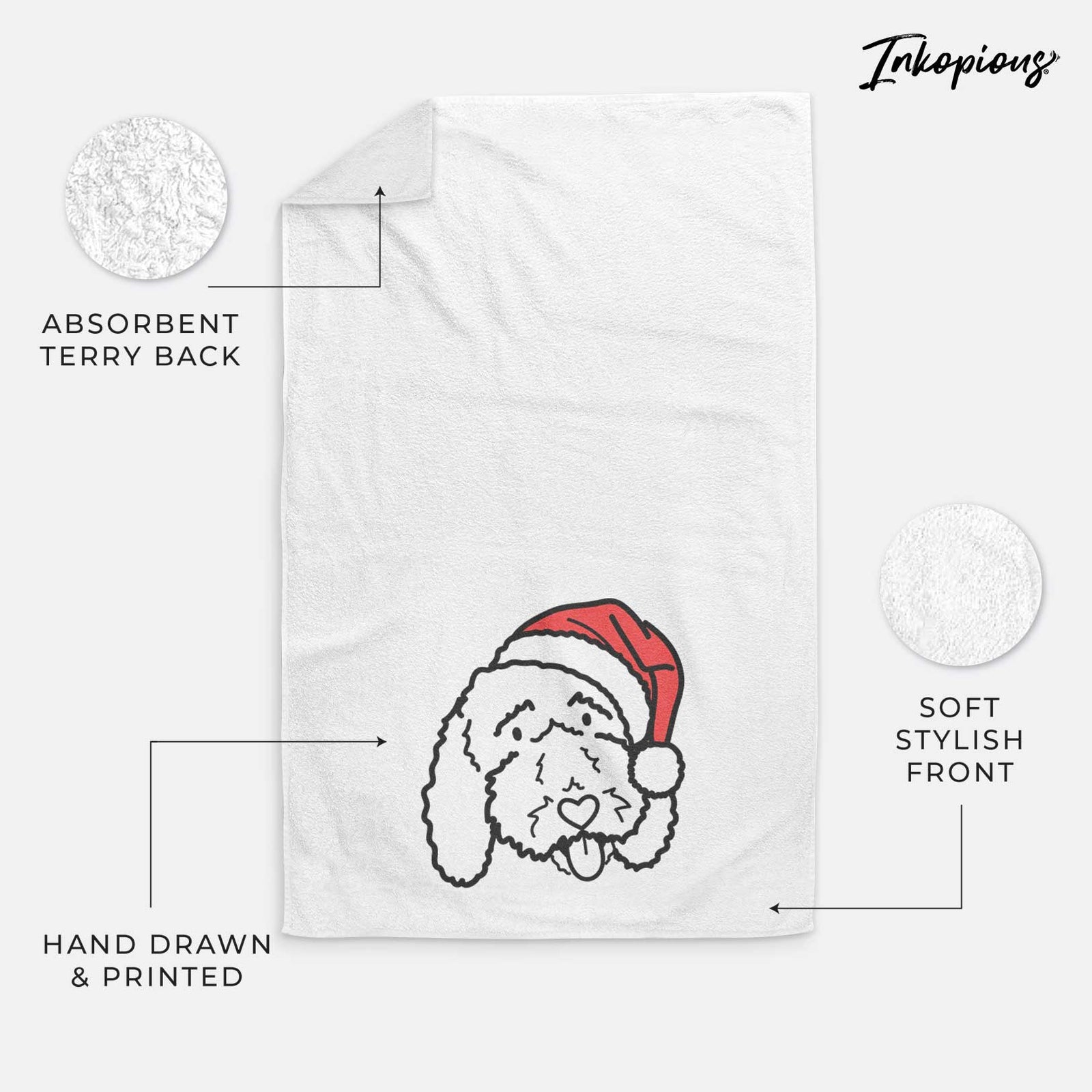 Minimalist line drawing of Ruby the Bernedoodle wearing a Santa hat on a decorative hand towel