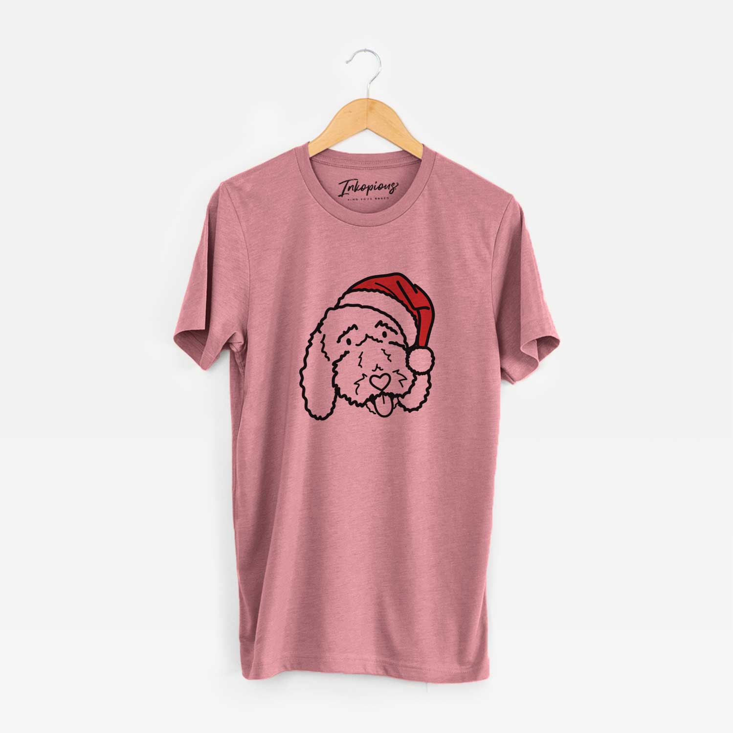 Minimalist line drawing of Ruby the Bernedoodle wearing a Santa hat on a Mauve Unisex crewneck