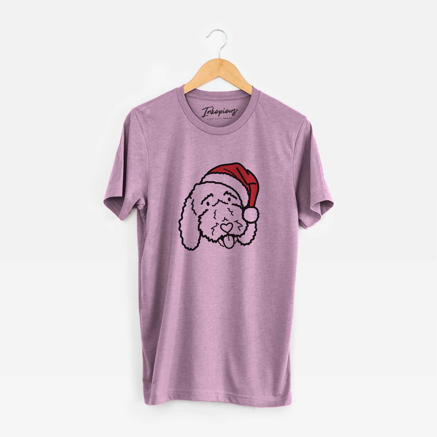 Minimalist line drawing of Ruby the Bernedoodle wearing a Santa hat on an Orchid Unisex crewneck