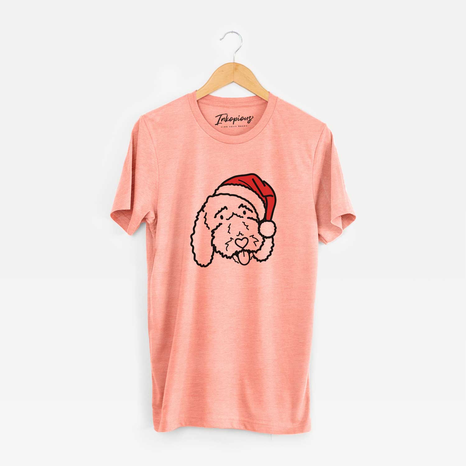 Minimalist line drawing of Ruby the Bernedoodle wearing a Santa hat on a Sunset Unisex crewneck