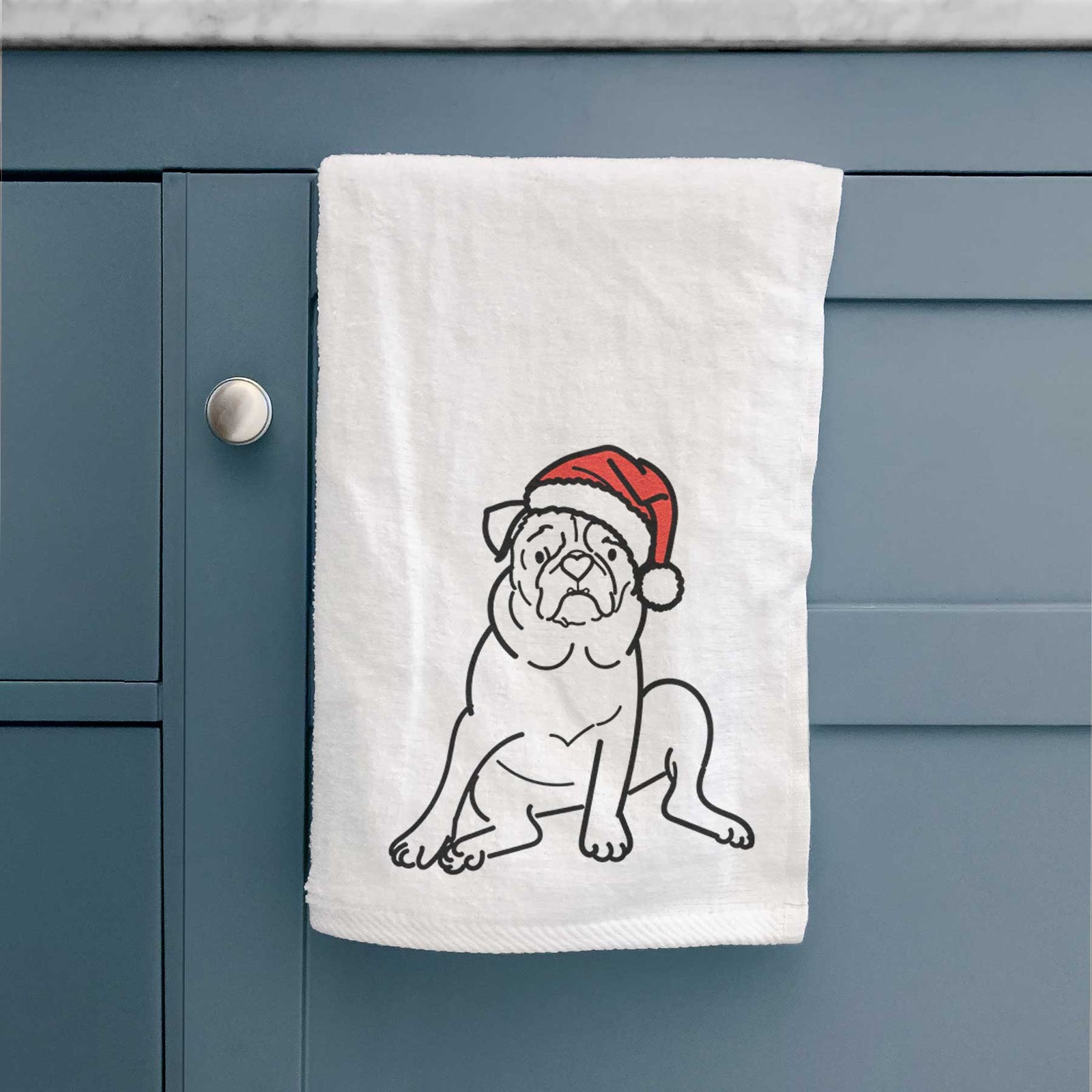 Minimalist line drawing of Rudy the Pug wearing a Santa hat on a decorative hand towel