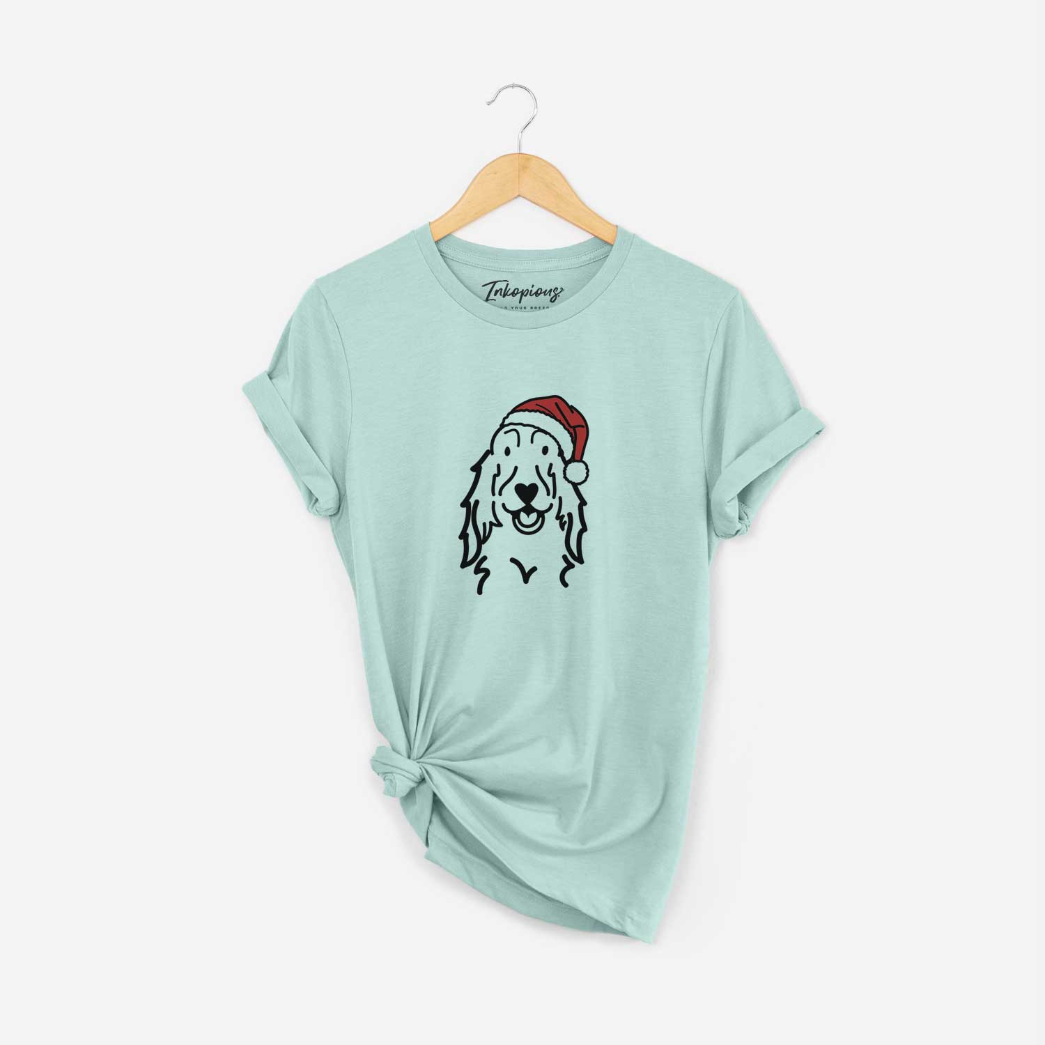Minimalist line drawing of a Setter wearing a Santa hat on a Heather Sage Unisex crewneck
