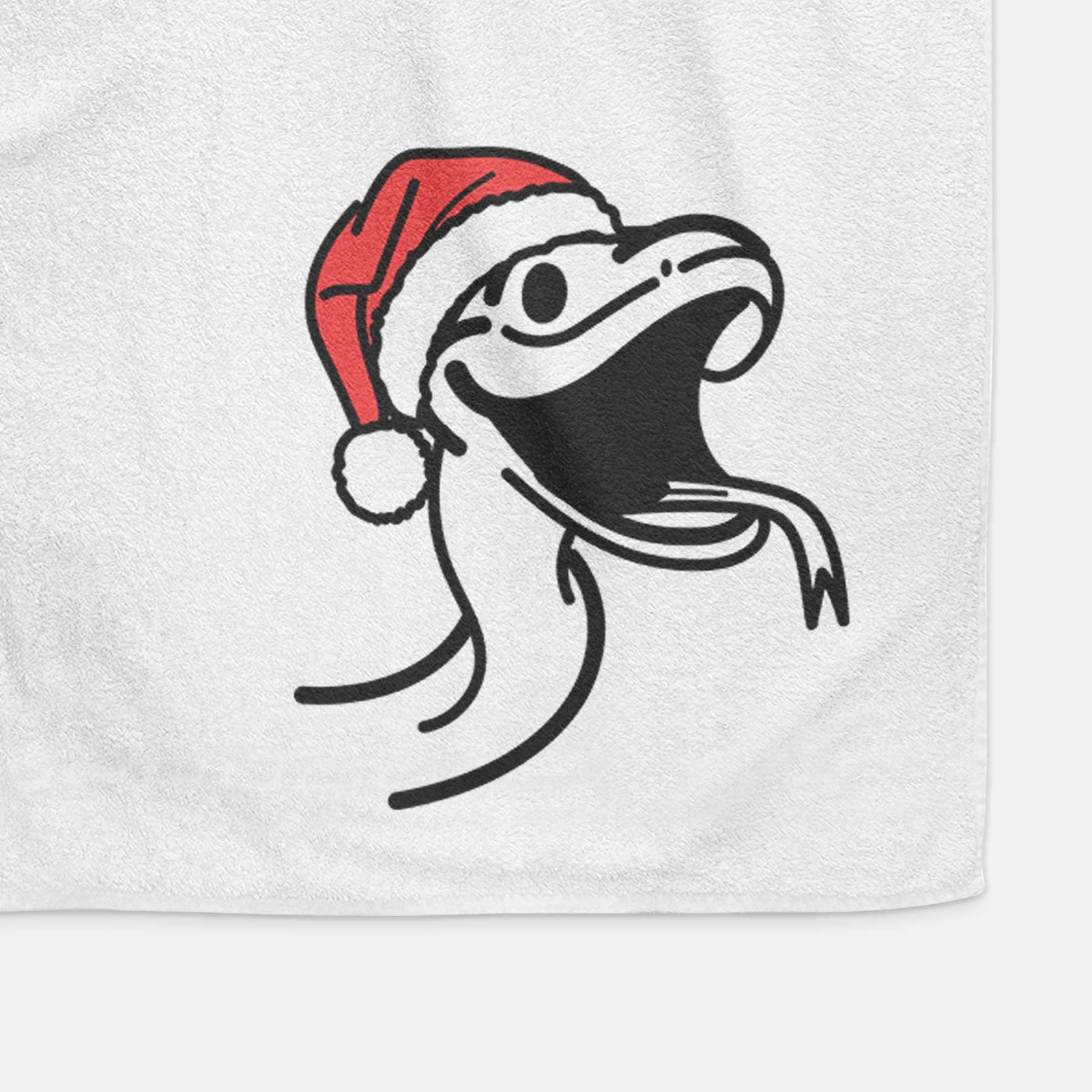 Minimalist line drawing of Spike the Snake wearing a Santa hat on a decorative hand towel
