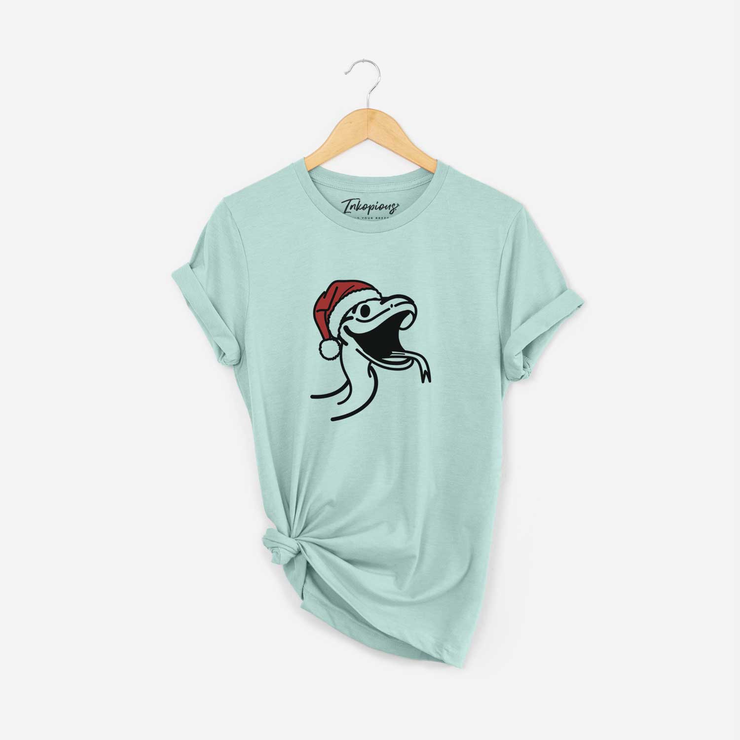 Minimalist line drawing of Spike the Snake wearing a Santa hat on a Heather Sage Unisex crewneck