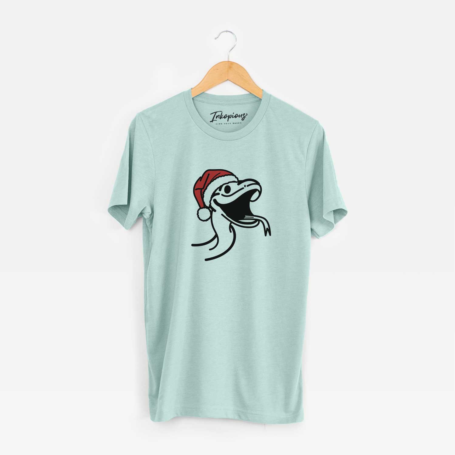 Minimalist line drawing of Spike the Snake wearing a Santa hat on a Heather Sage Unisex crewneck