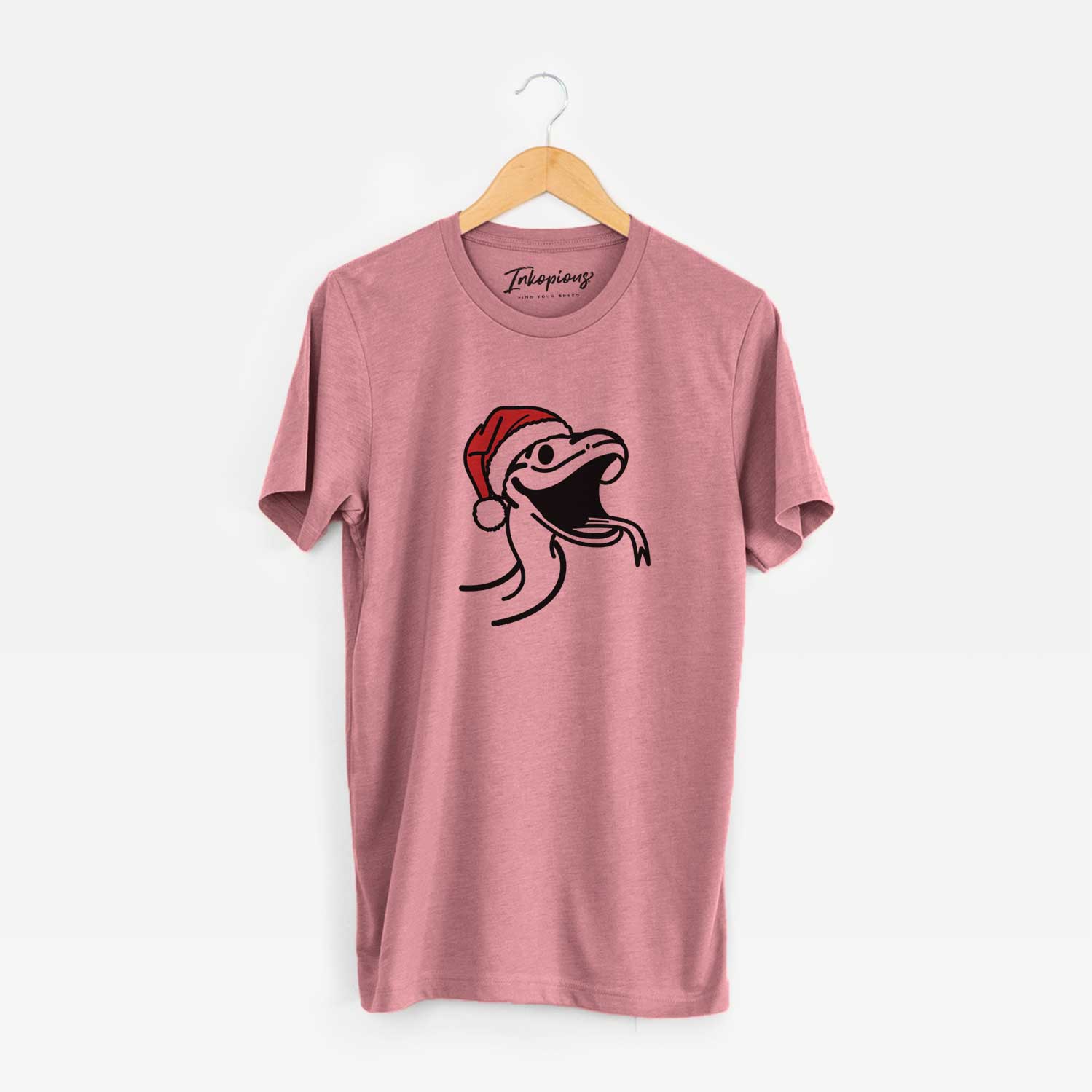 Minimalist line drawing of Spike the Snake wearing a Santa hat on a Mauve Unisex crewneck