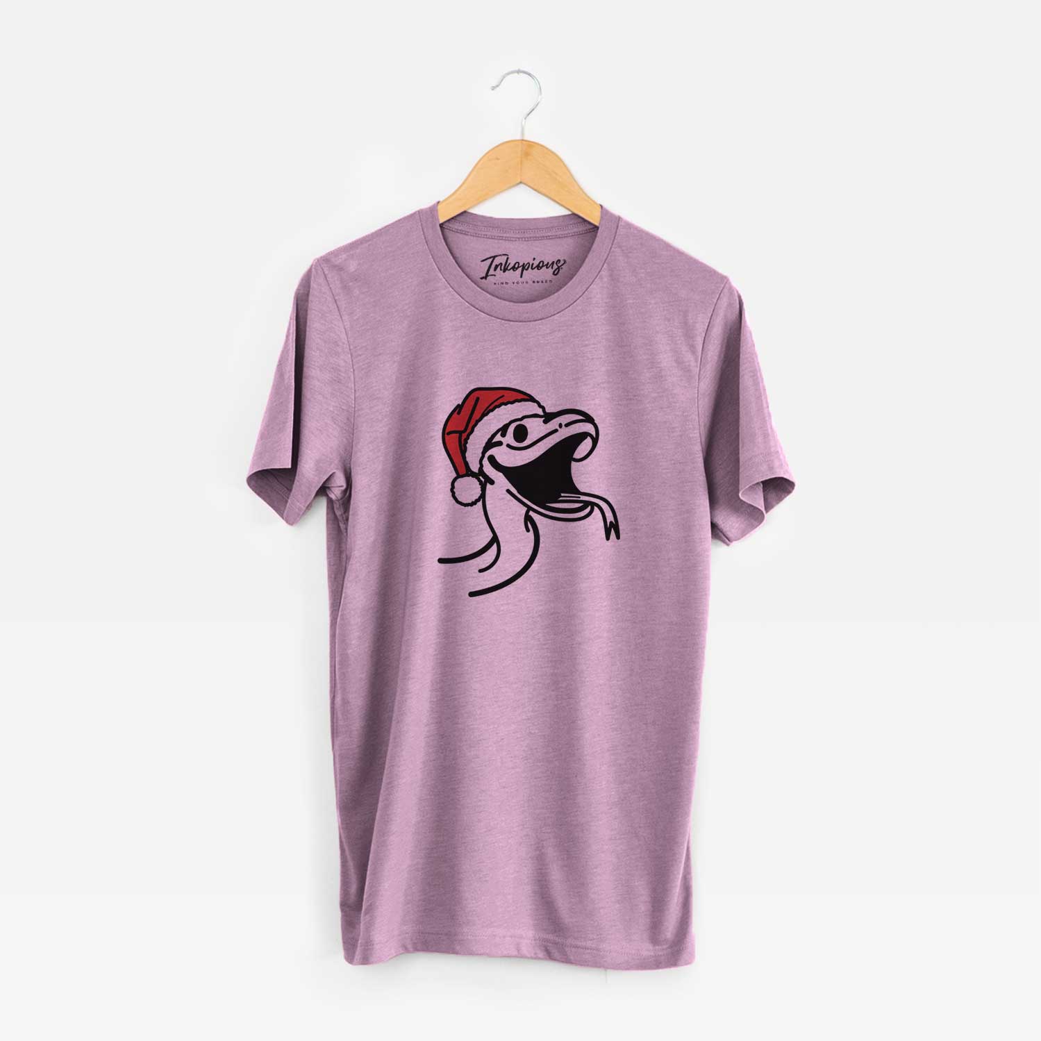 Minimalist line drawing of Spike the Snake wearing a Santa hat on an Orchid Unisex crewneck