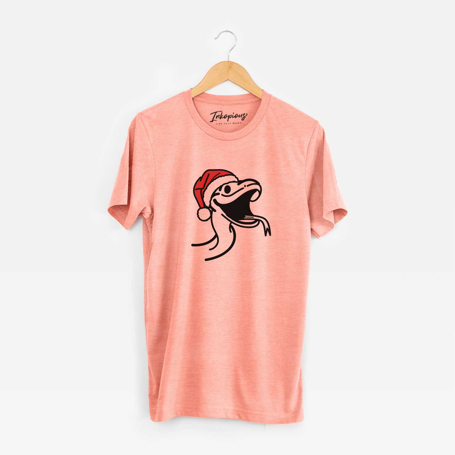 Minimalist line drawing of Spike the Snake wearing a Santa hat on a Sunset Unisex crewneck