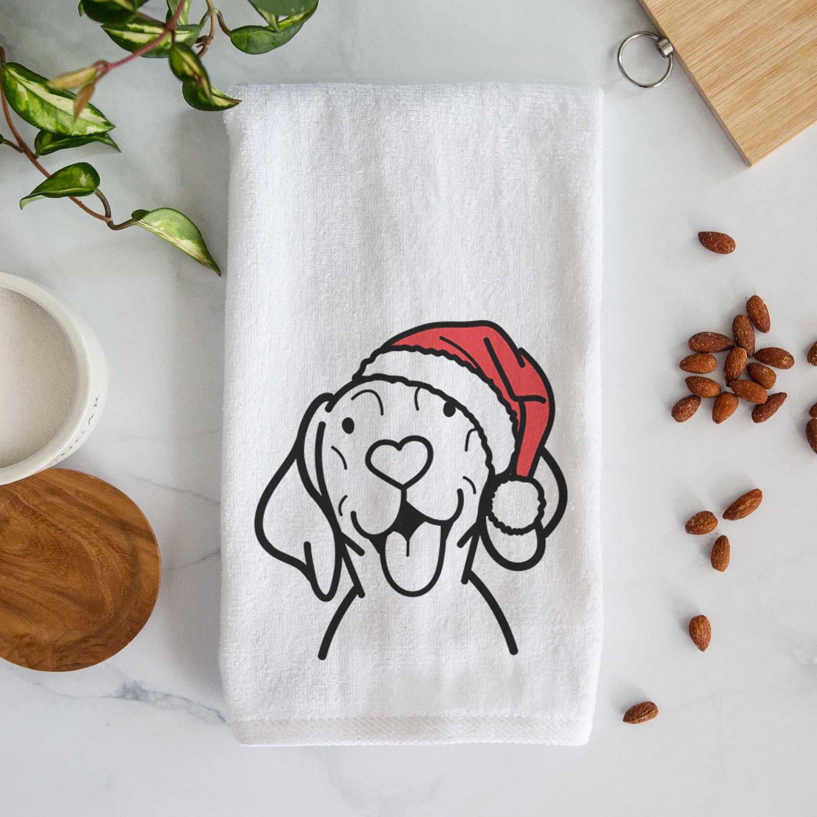 Minimalist line drawing of a Vizsla wearing a Santa hat on a decorative hand towel