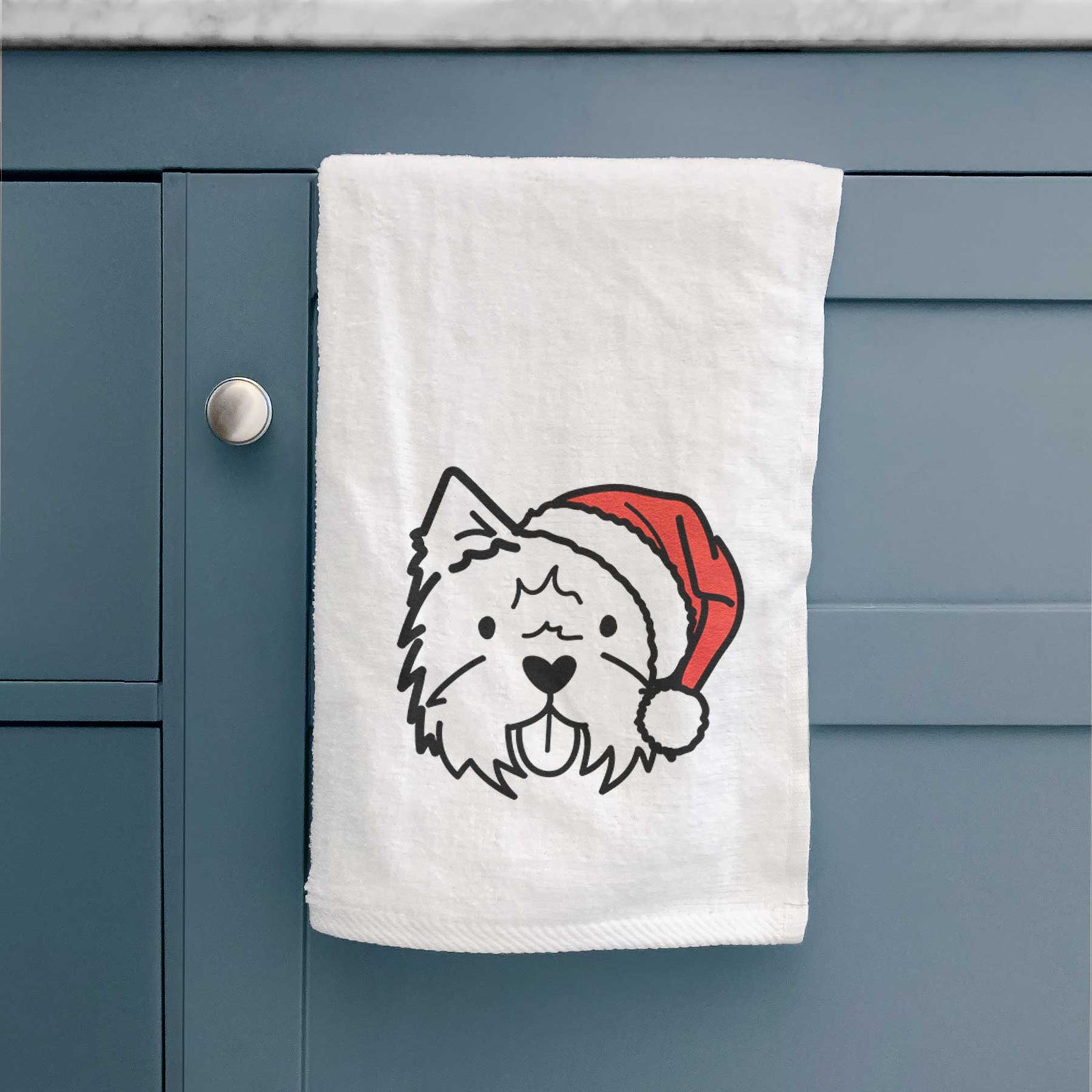 Minimalist line drawing of a West Highland Terrier wearing a Santa hat on a decorative hand towel