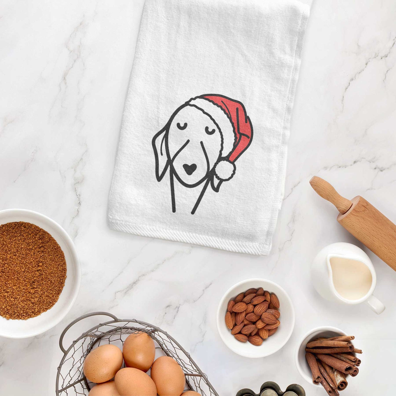 Minimalist line drawing of a Whippet wearing a Santa hat on a decorative hand towel