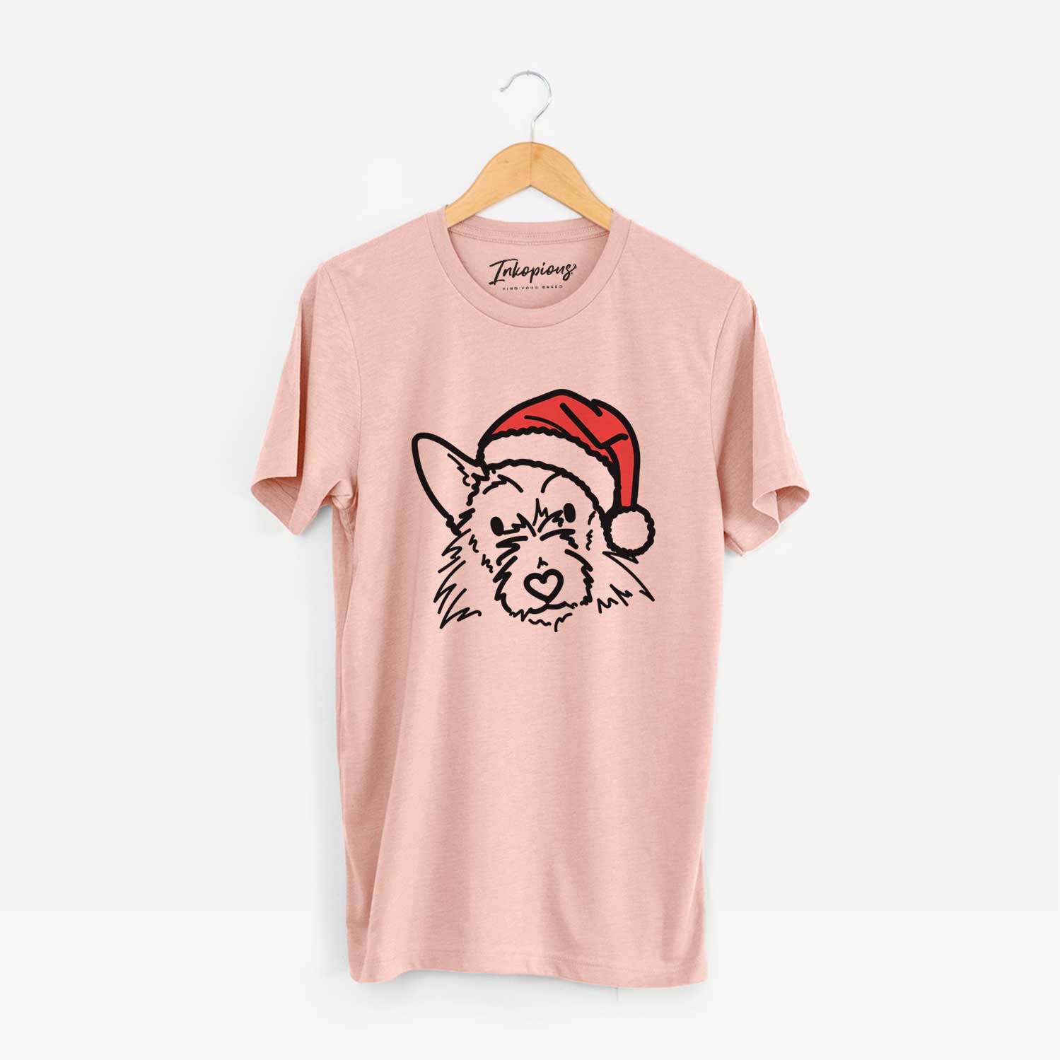 Minimalist line drawing of Ziggy the Terrier Mix wearing a Santa hat on a Peach Unisex crewneck