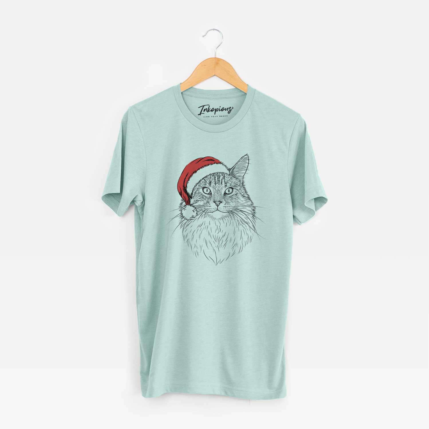 Hand-drawn sketch of Angel the Maine Coon Cat wearing a Santa hat on a Heather Sage Unisex crewneck