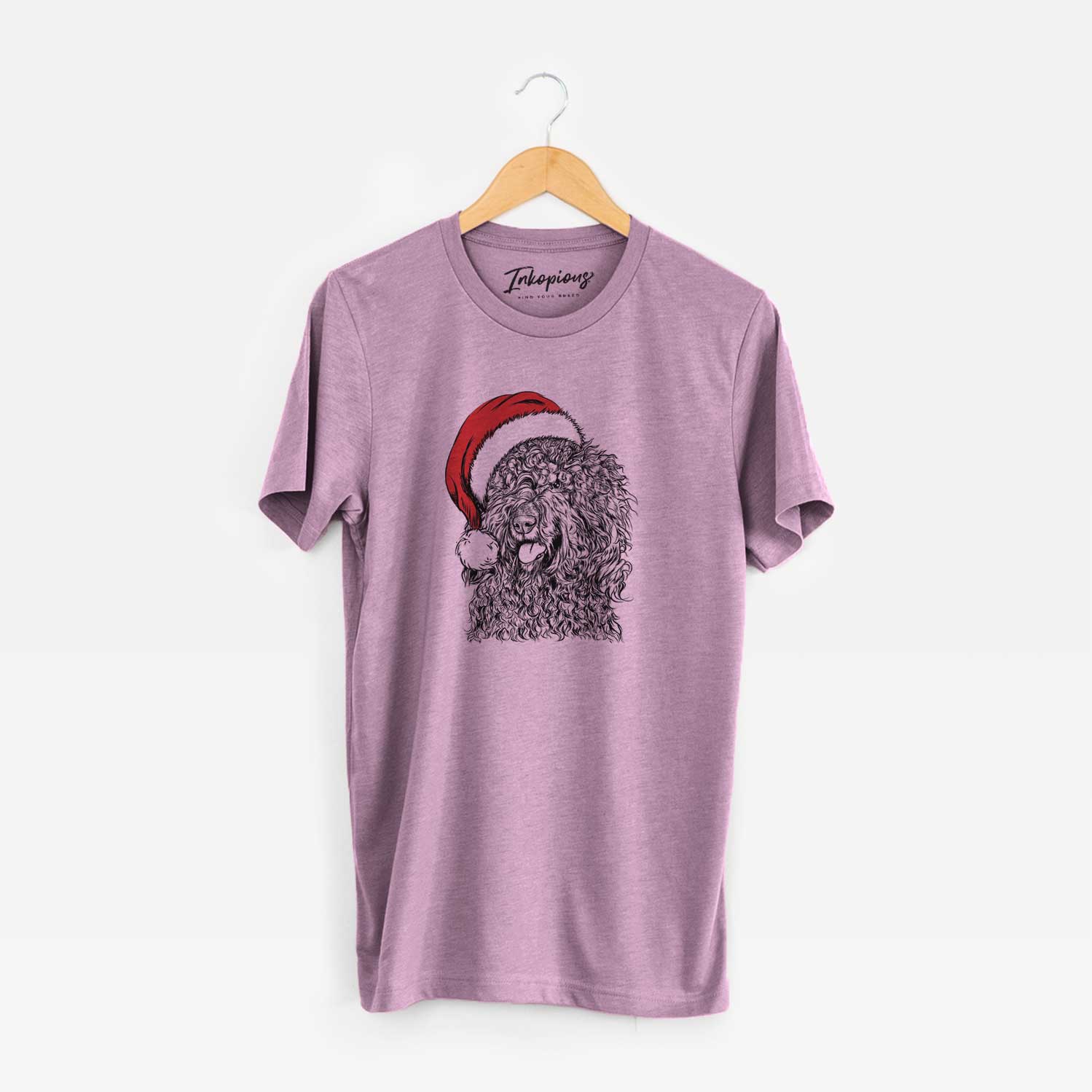 Hand-drawn sketch of Babs the Barbet wearing a Santa hat on an Orchid Unisex crewneck