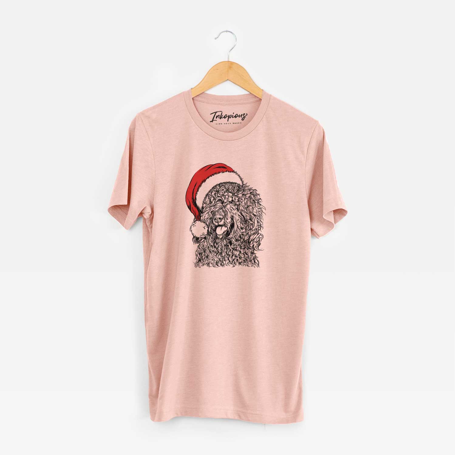Hand-drawn sketch of Babs the Barbet wearing a Santa hat on a Peach Unisex crewneck
