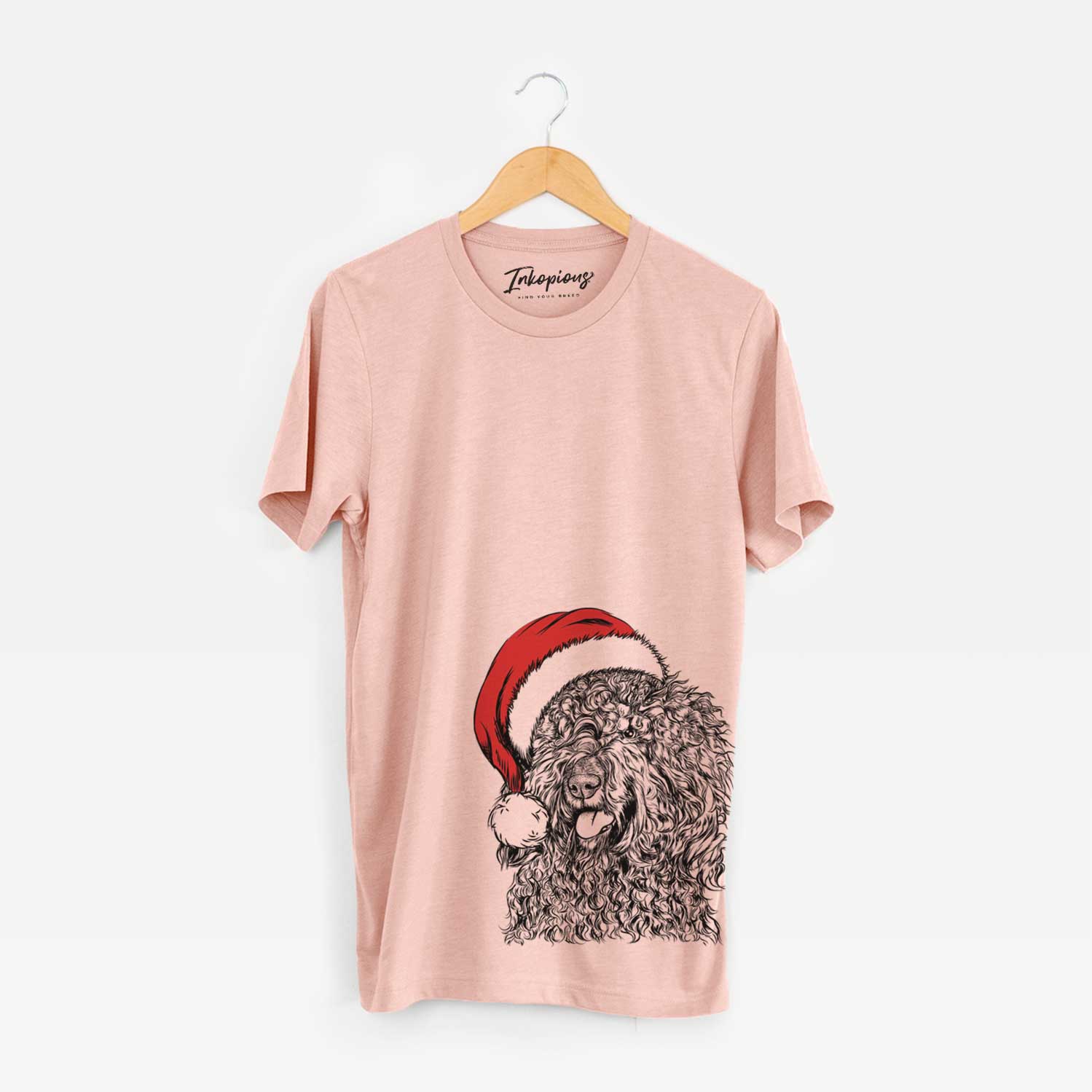 Hand-drawn sketch of Babs the Barbet wearing a Santa hat on a Peach Unisex crewneck