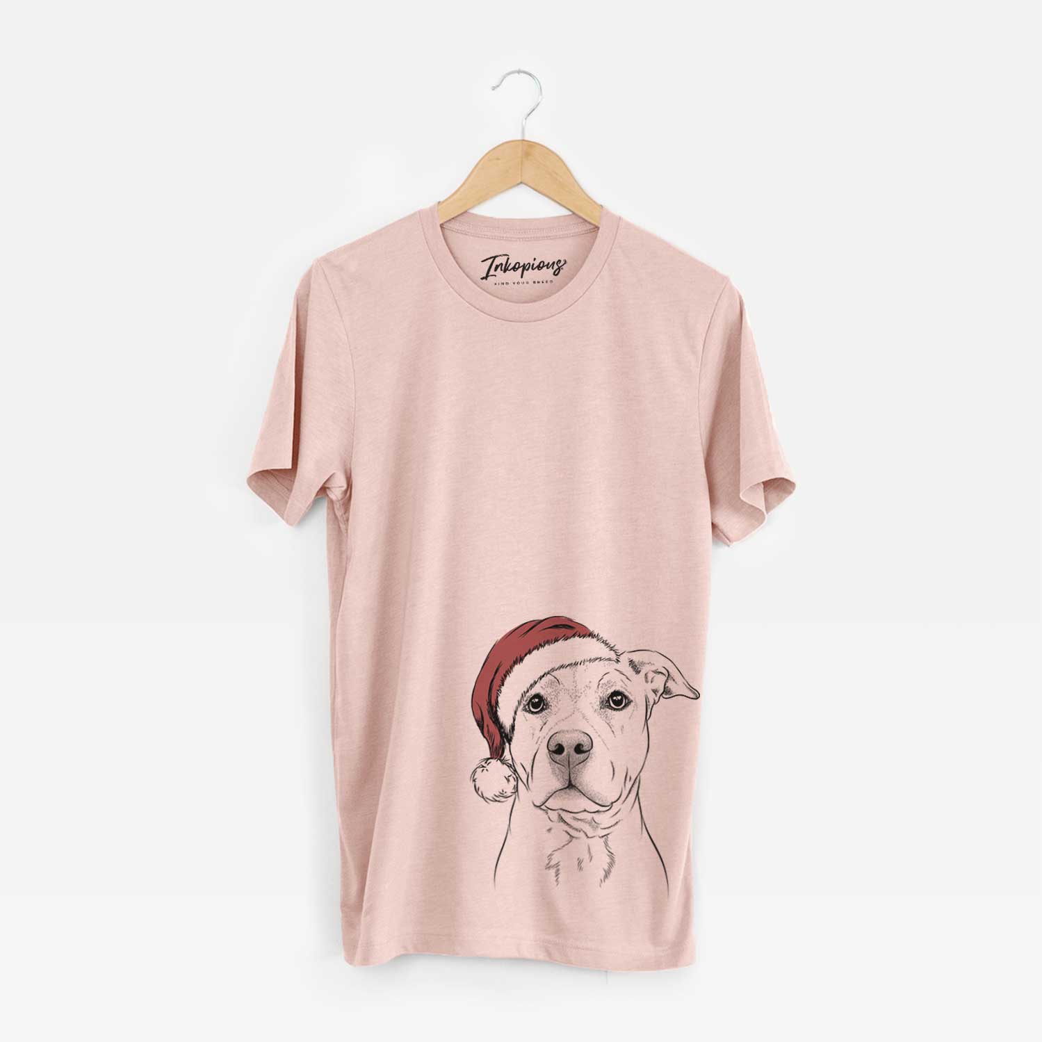 Hand-drawn sketch of Bailey the American Staffordshire Terrier wearing a Santa hat on a Peach Unisex crewneck