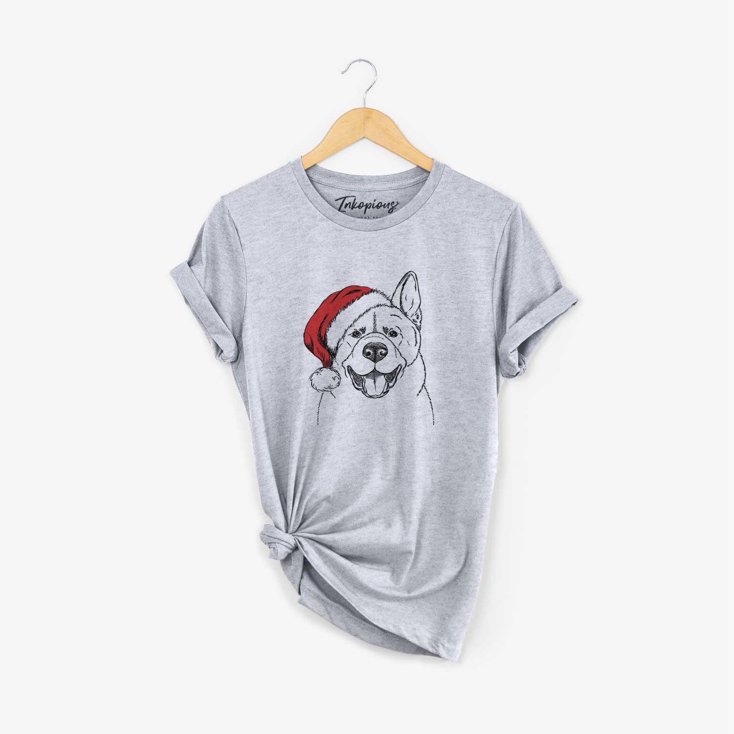 Hand-drawn sketch of Baku the Akita wearing a Santa hat on a Grey Unisex crewneck