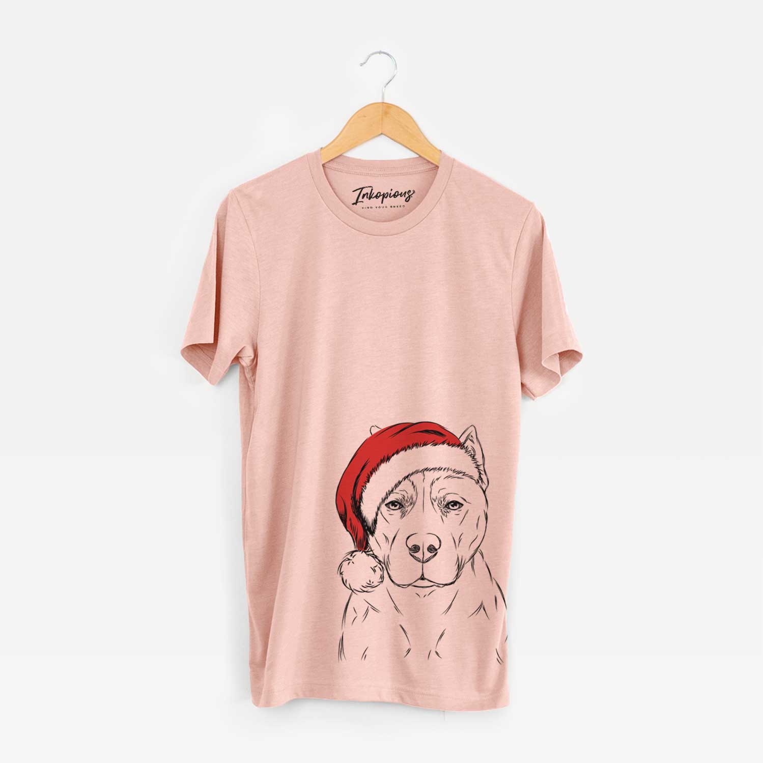 Hand-drawn sketch of Bane the Pitbull Mix wearing a Santa hat on a Peach Unisex crewneck