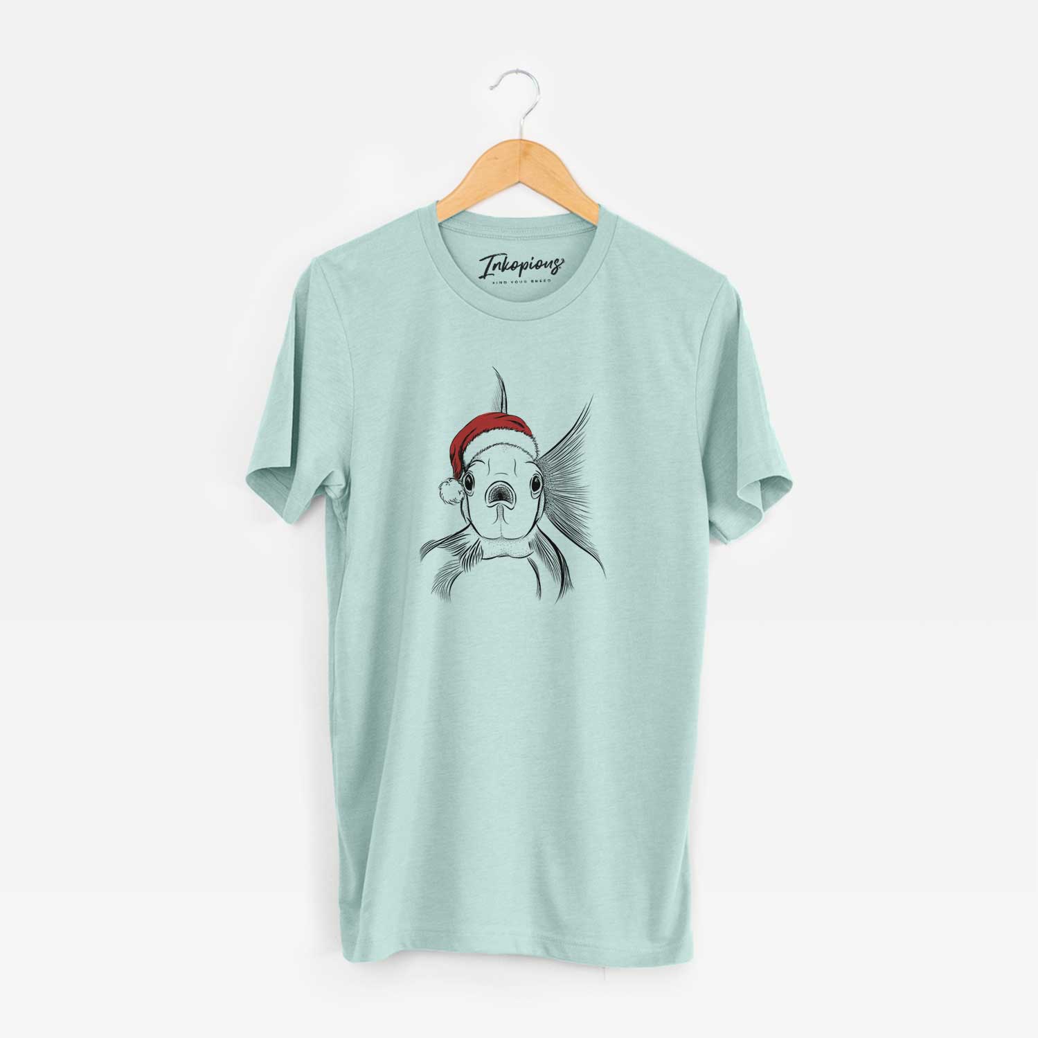 Hand-drawn sketch of Beefcake the Goldfish wearing a Santa hat on a Heather Sage Unisex crewneck