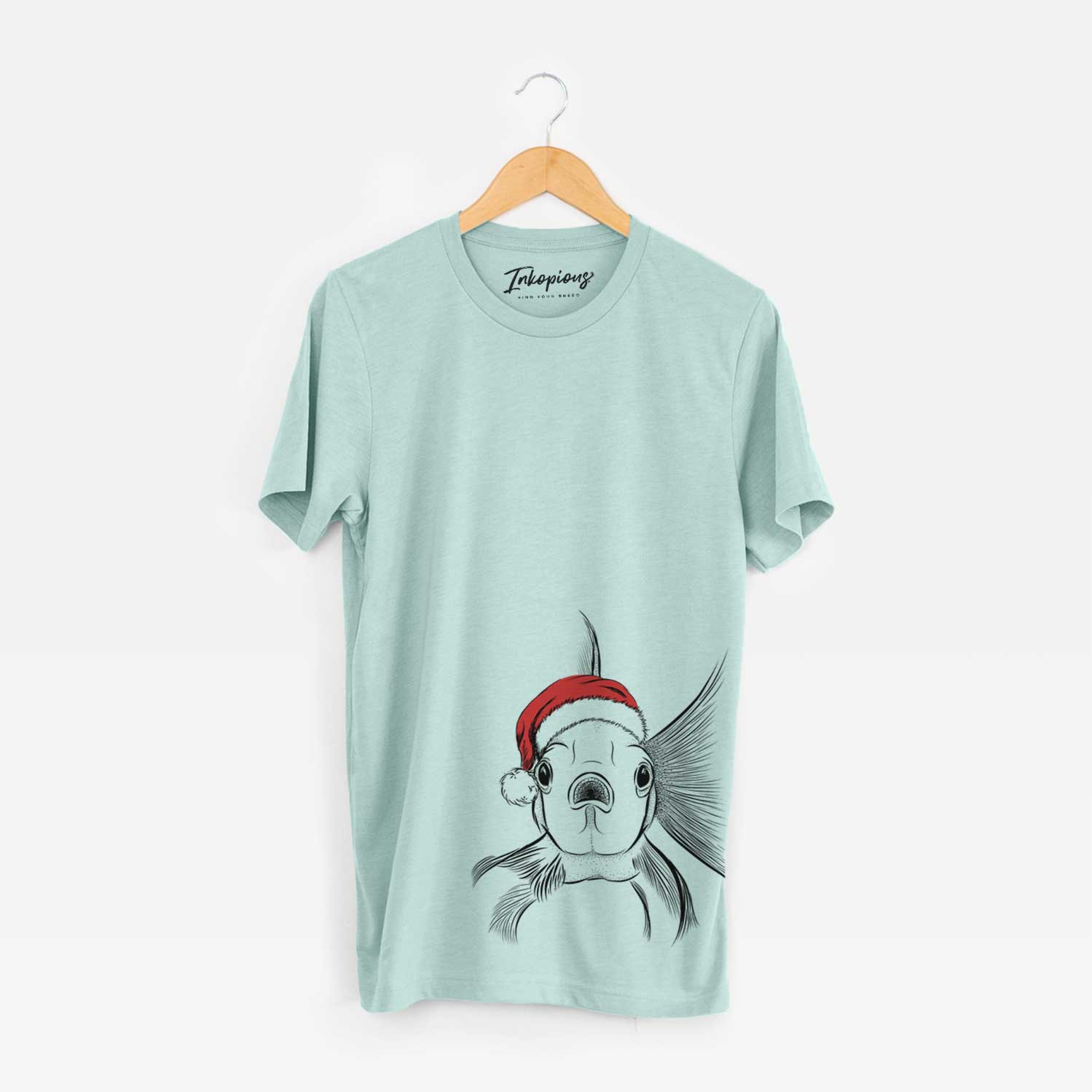 Hand-drawn sketch of Beefcake the Goldfish wearing a Santa hat on a Heather Sage Unisex crewneck